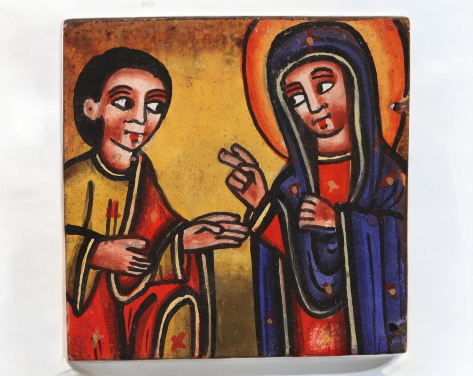 ETHIOPIA: Hand-Painted Wooden Icon - 5.3x5.2cm, 6g: A finely crafted Ethiopian Orthodox wooden icon, featuring a beautifully hand-painted depiction of the Virgin Mary and Christ Child on one side and an intricate carved cross motif on the reverse. The 