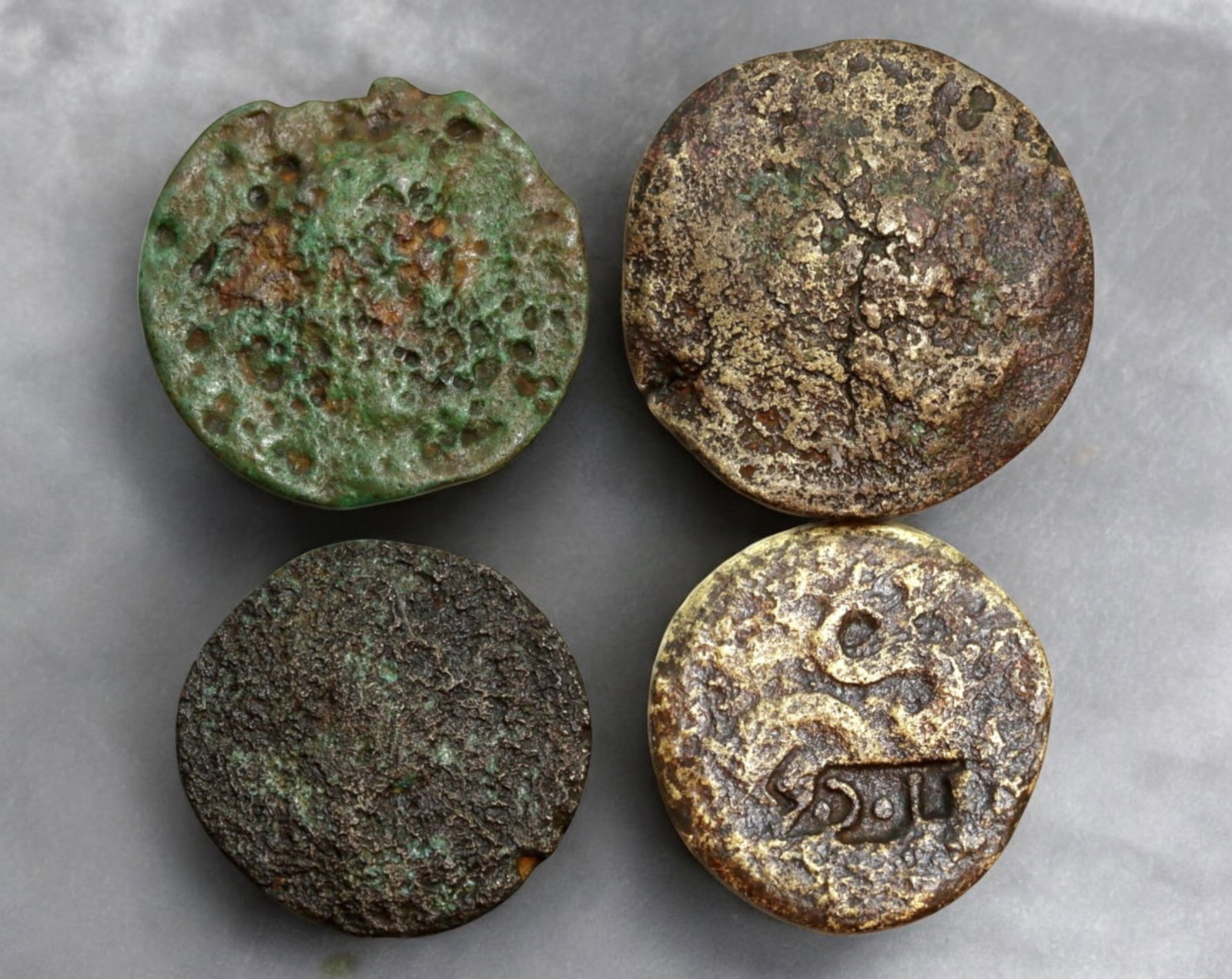 ROMAN EMPIRE: AE Coins - Bronze Coins, 25-30mm, 31g (Lot of 9): A collection of four ancient Roman bronze coins, each featuring a distinct imperial portrait on the obverse and various symbolic or military-themed reverses. These coins, essential to Roman commerce a