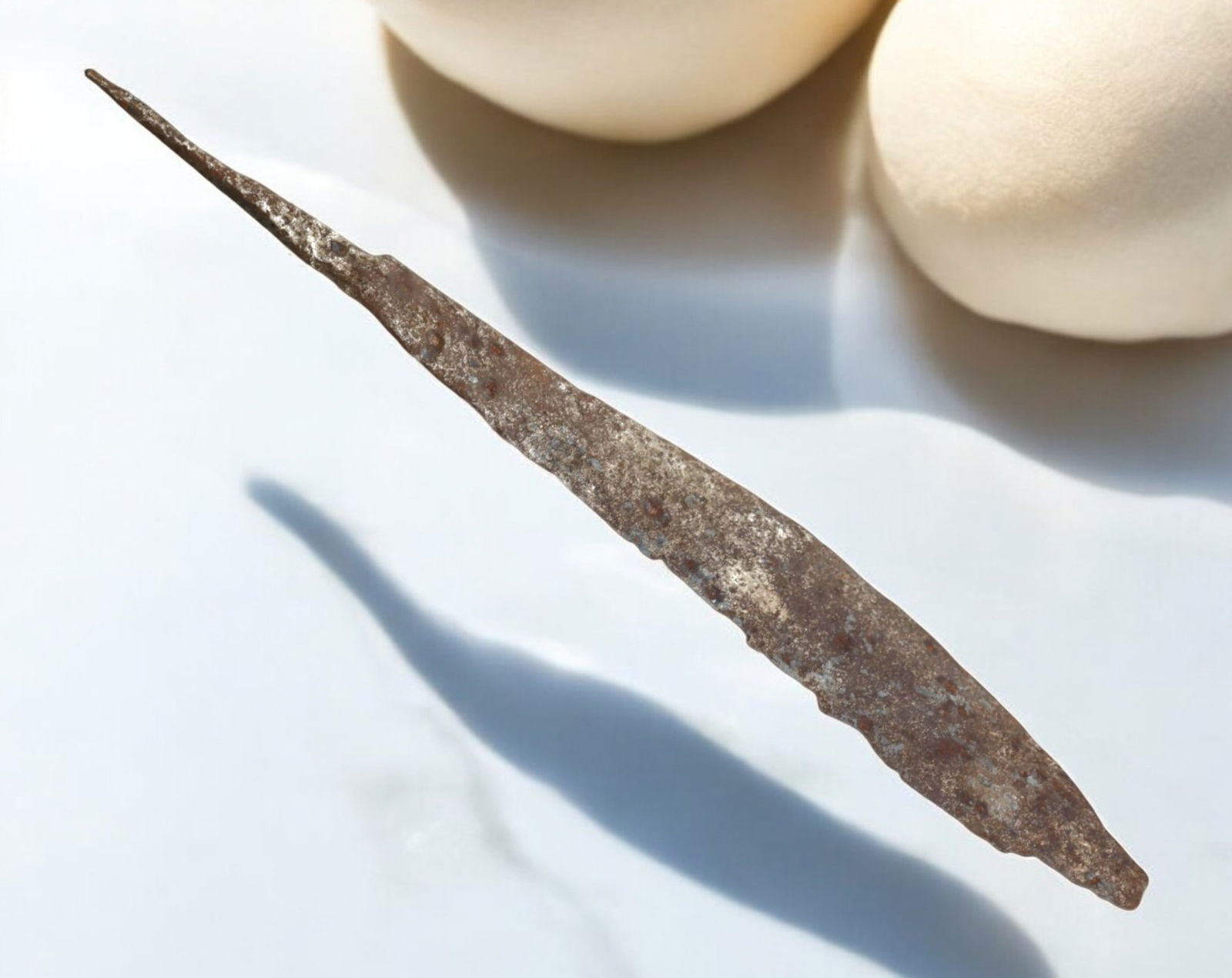 ANTIQUE IRON BLADE: Forged Utility Tool or Weapon Fragment, 3.5x26cm, 135g: This antique iron blade showcases a tapered, elongated form with a weathered surface, reflecting its long history and functional craftsmanship. Likely used as a tool or weapon, the piece exhibits sign