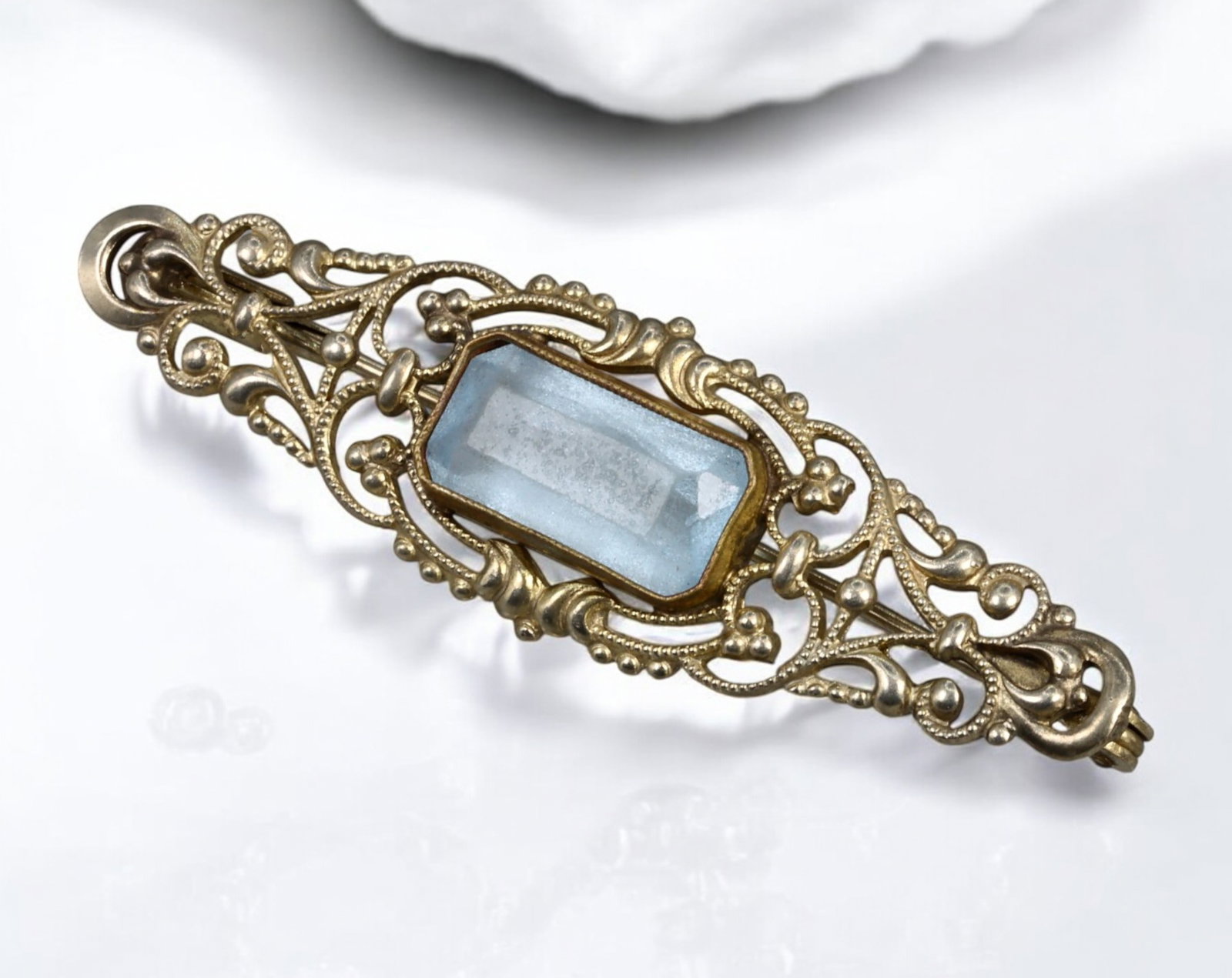 ART NOUVEAU: Pendant - Gilt Filigree & Natural Aquamarine, ca. 1900: This finely executed Art Nouveau pendant exemplifies the movement's lyrical elegance and embrace of natural materials. Cast in gilt metal with intricate pierced scrollwork, it measures 5 x 1.5 cm and 