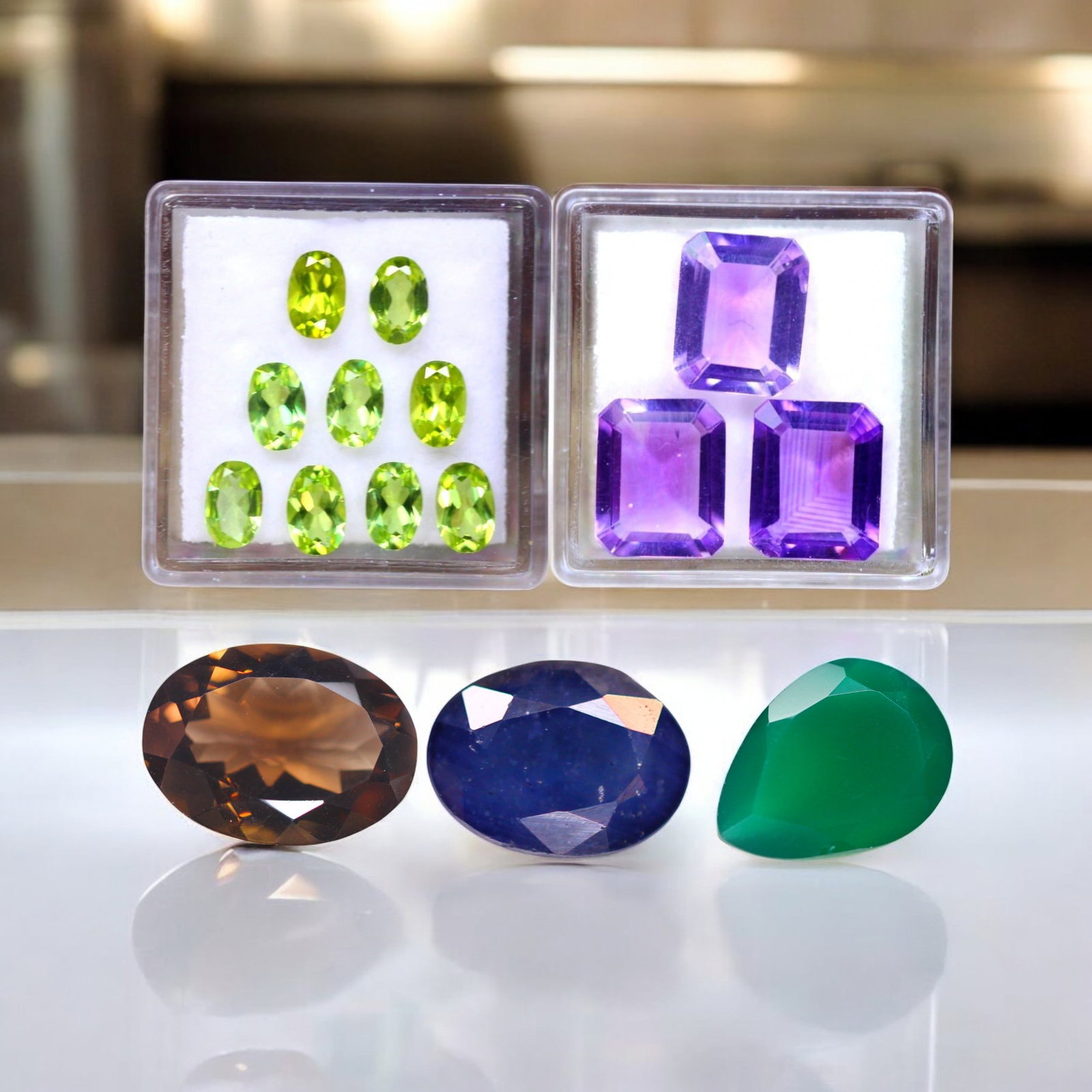 Amethyst, Peridot, Smoky Quartz, Blue Sapphire & Onyx: A refined selection of five premium gemstones, each featuring distinct colors, expert cuts, and exceptional clarity. The Amethyst set (3pcs, 9.85ct total, 11x8.9x4.6mm) showcases deep violet emerald-c