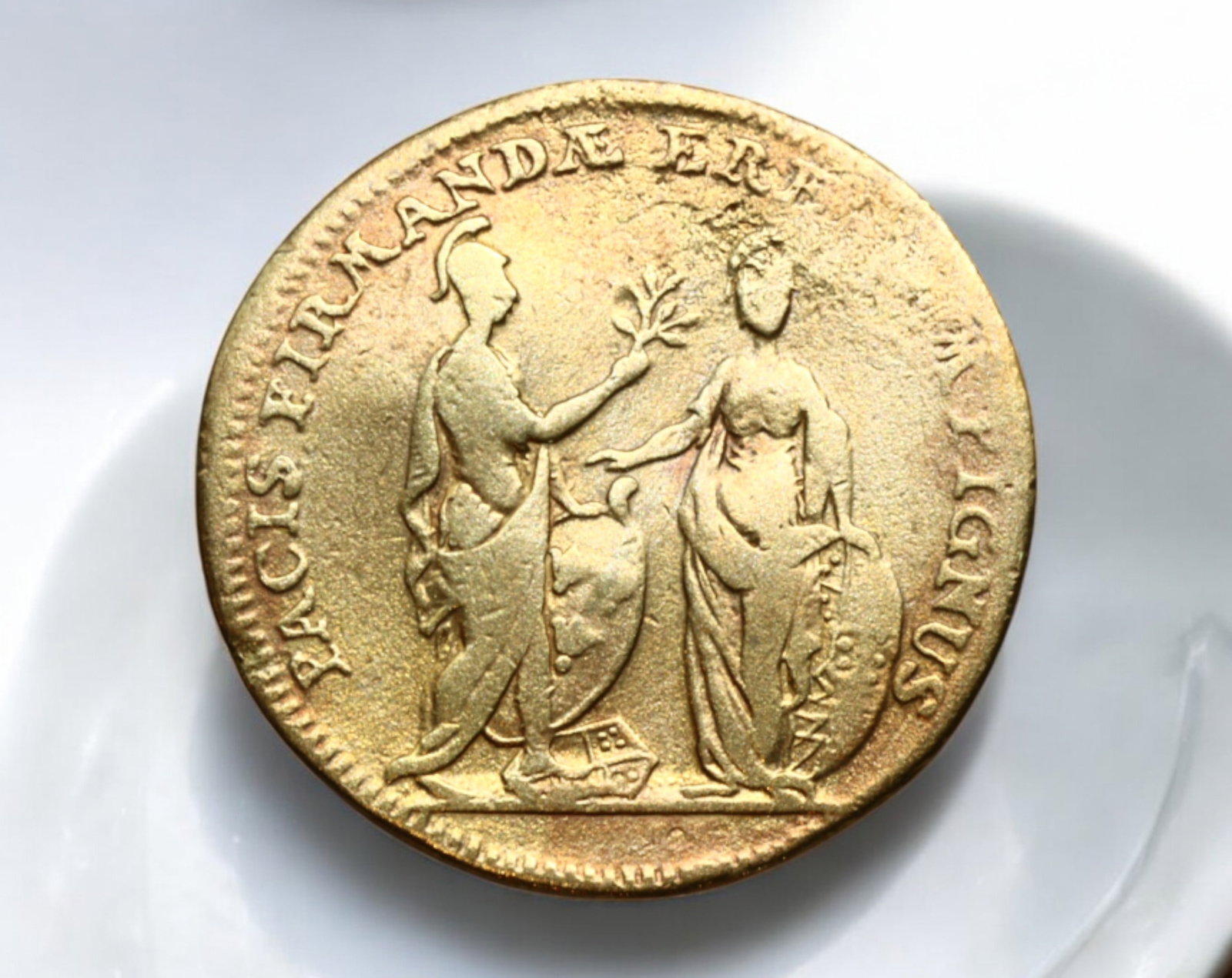 FRANCE: Louis XV Brass Jeton - 24mm, 4.9g, 18th Century: A historical brass jeton issued during the reign of Louis XV (1715-1774), measuring 24mm in diameter and weighing 4.9g. The obverse features a right-facing bust of the king adorned in classical attire