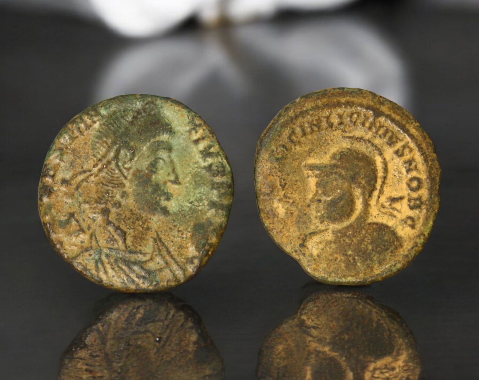 ROMAN EMPIRE: AE Coins - Bronze Coins, 2cm, 5.8g, 2pcs: A collection of ancient Roman bronze coins, each featuring a distinct imperial portrait on the obverse and various symbolic or military-themed reverses. These coins, essential to Roman commerce and go