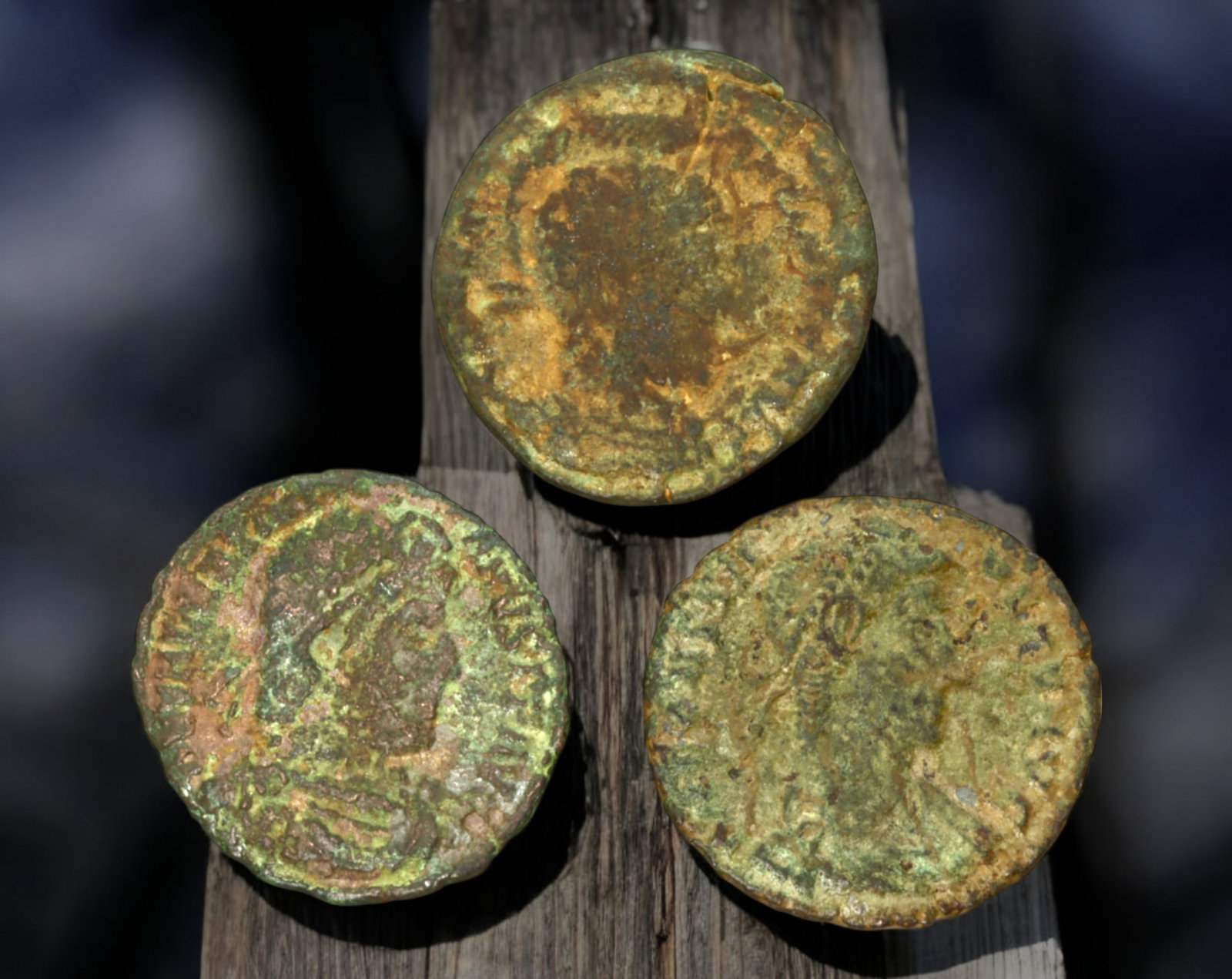 ROMAN EMPIRE: AE Coins - Bronze Coins, 17-19mm, 6.6g (Lot of 3): A collection of ancient Roman bronze coins, each featuring a distinct imperial portrait on the obverse and various symbolic or military-themed reverses. These coins, essential to Roman commerce and go