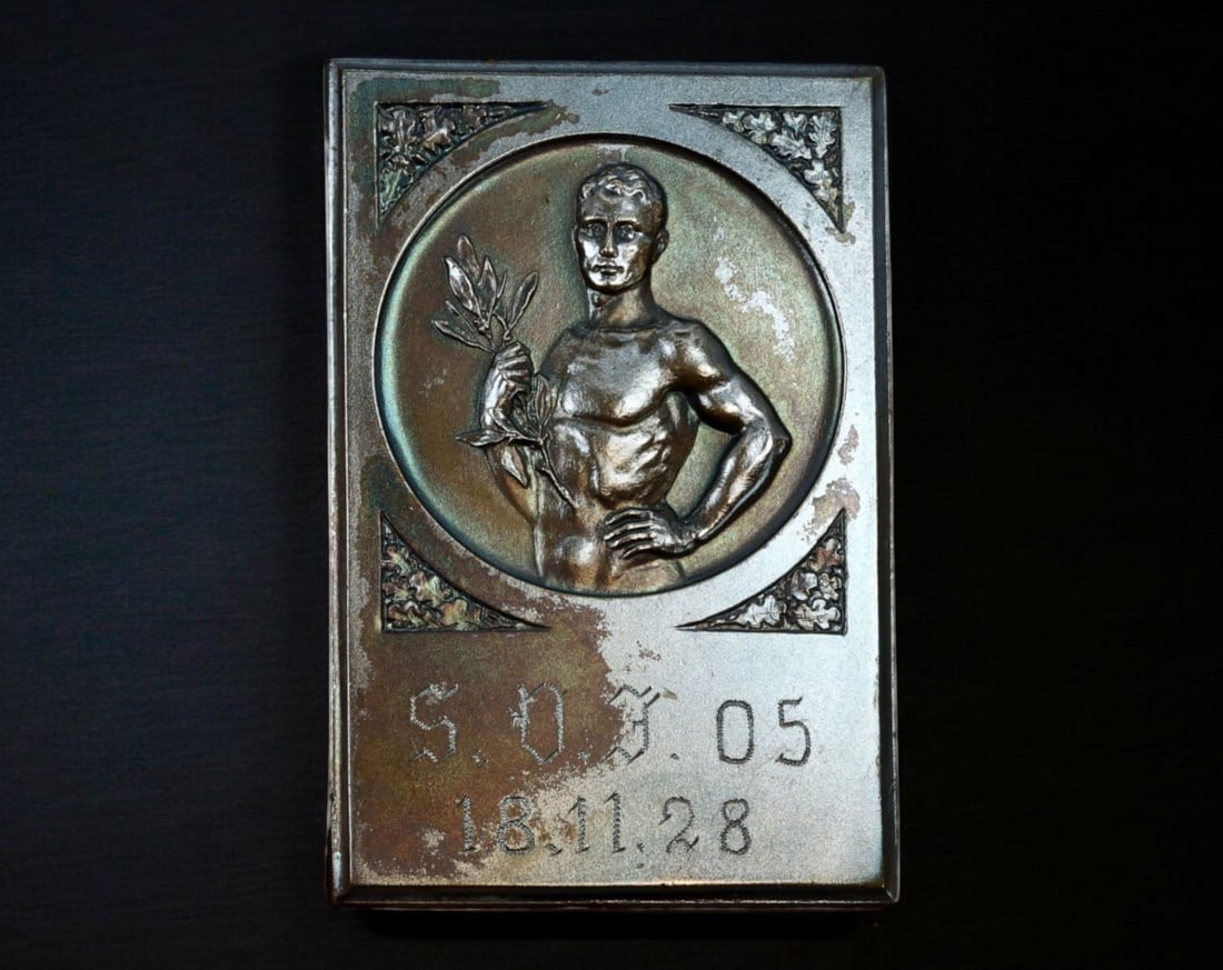 GERMANY: S.O.T. 05 Athletics Sport Plaque - Bronze, 1928: A well-crafted rectangular bronze plaque (60mm x 40mm, 54g), awarded on November 18, 1928, likely for an athletic or sports competition organized by S.O.T. 05. The obverse features a striking high-rel