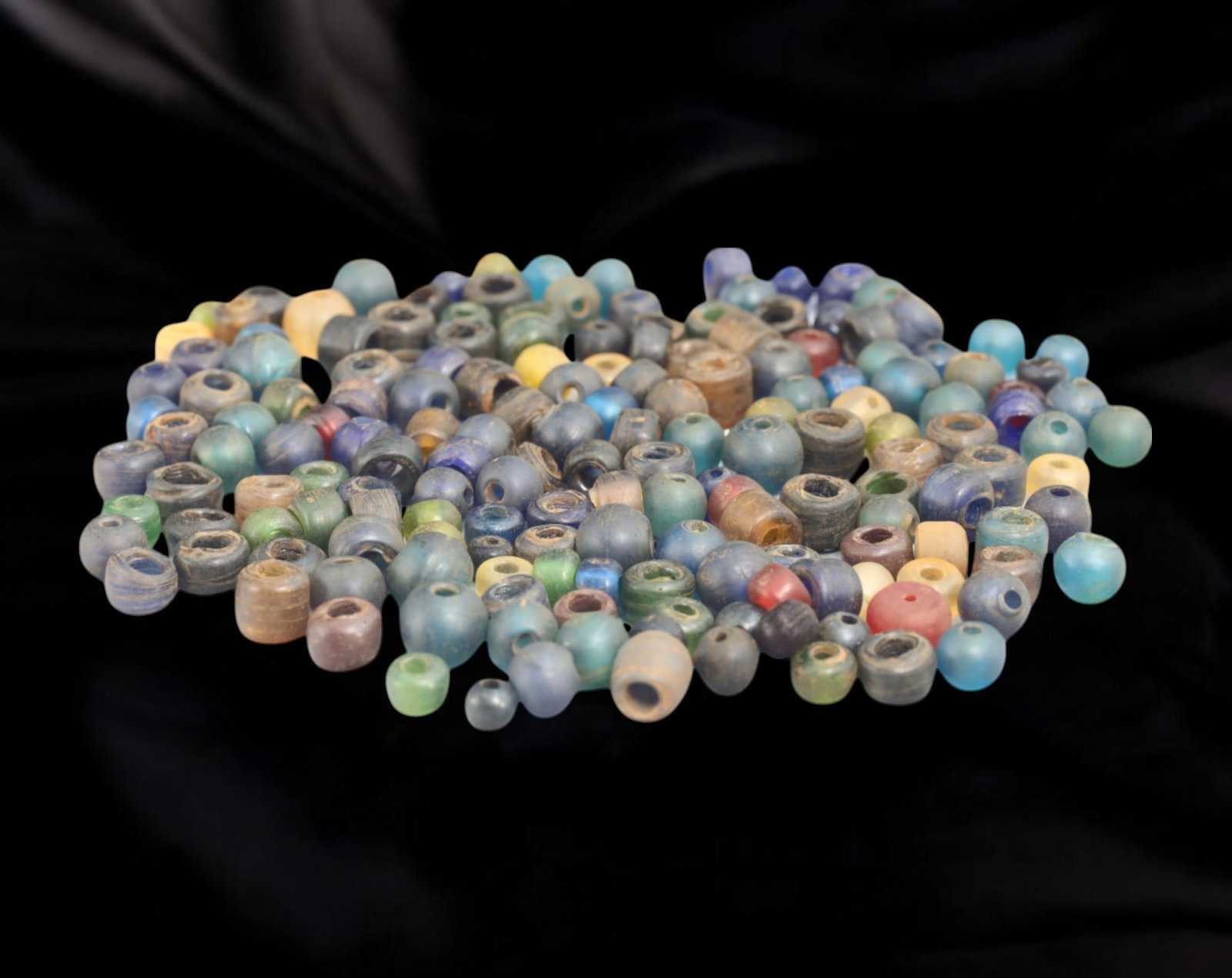 Collection of Vintage Art Glass Beads - Antique & Handmade, 155g: A captivating assortment of vintage and antique art glass beads, showcasing masterful craftsmanship and unique design elements. These handcrafted beads exhibit intricate detailing, applied textures, a