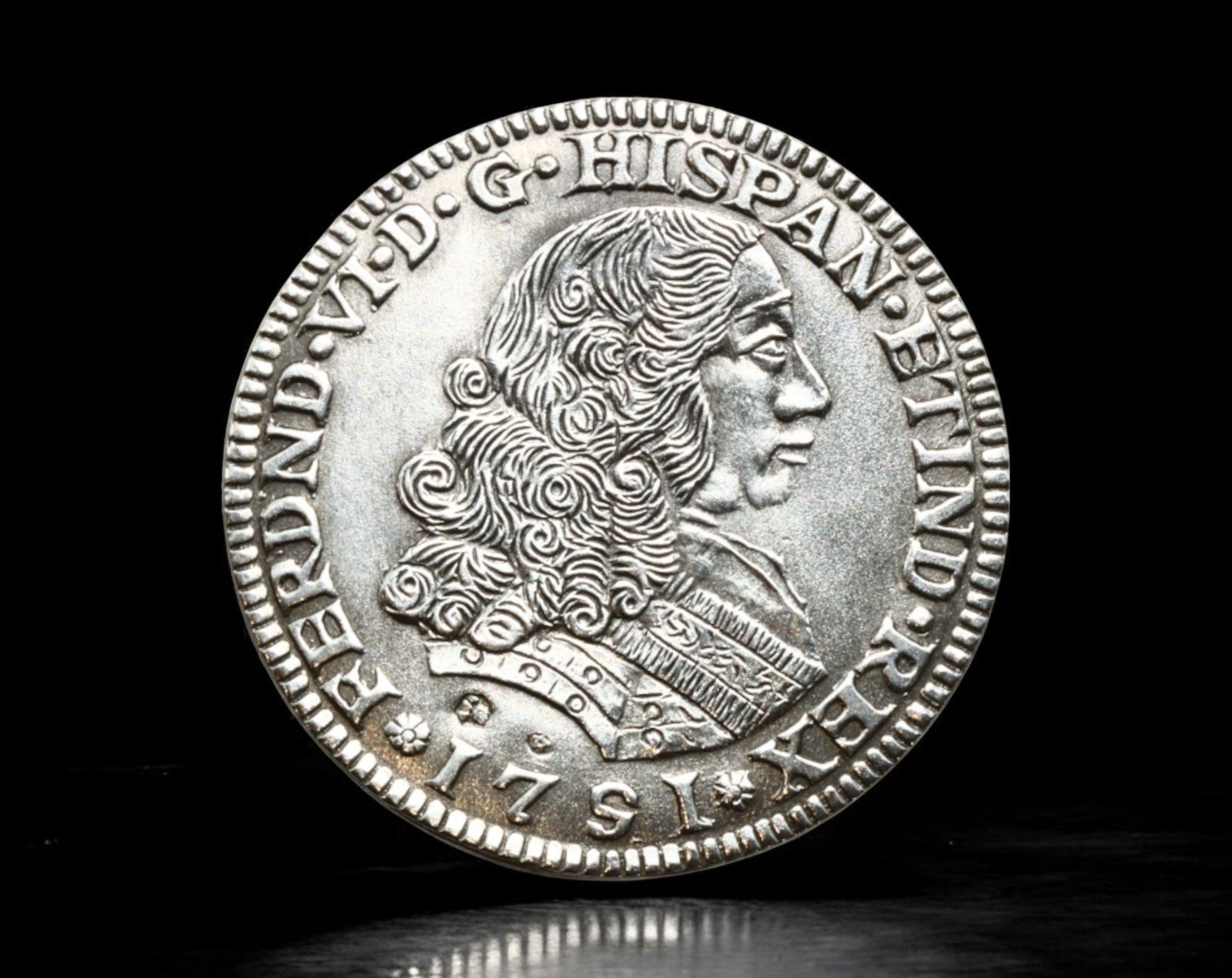 SPAIN: 1719 Ferdinand VI Fantasy Reproduction - Silver-Plated, 30mm, 3g: A silver-plated fantasy reproduction of a 1719 Ferdinand VI coin, struck in 30mm diameter and weighing 3g. This piece replicates the Baroque-era style, featuring a right-facing bust of King Ferdinand 