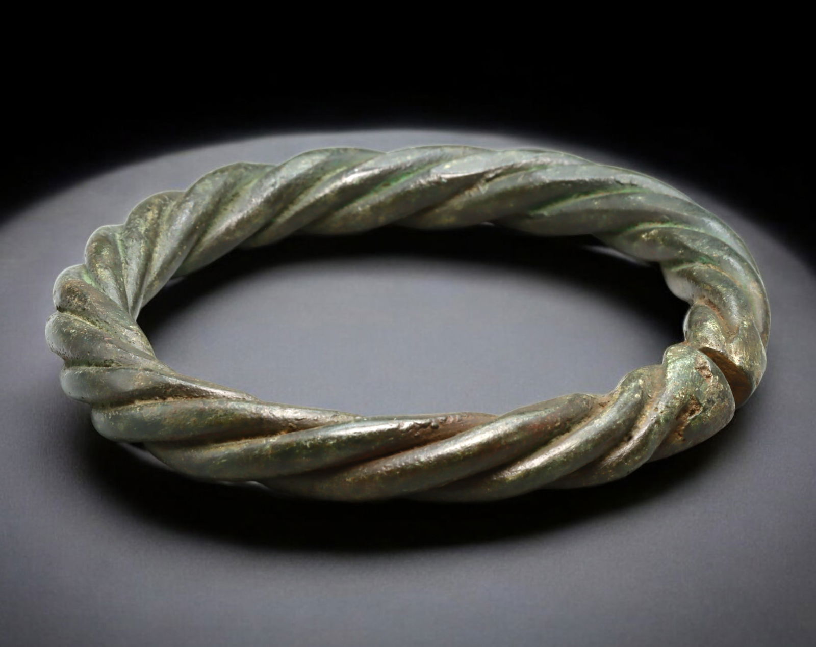 WEST AFRICA: Bronze Currency Bracelet - Fully Twisted Form, 8.6 cm dia. (1 of 3)