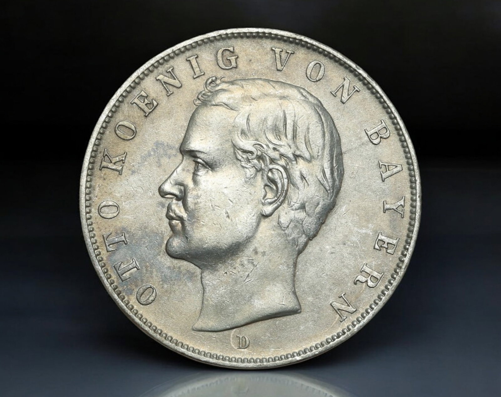 GERMANY: Otto I of Bavaria - Silver 3 Mark Coin, 'Bavaria' Type, 1910 D (Munich Mint): Struck in 1910 at the Munich Mint, this 3 Mark coin represents the enduring symbolism of Bavarian sovereignty within the German Empire. Composed of 90% silver and weighing 16.6g, the piece spans 33mm 