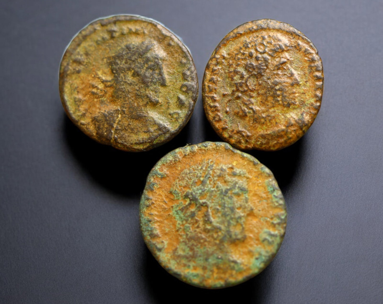 ROMAN EMPIRE: AE Coins - Bronze Issue, 15-18mm, 3g, Lot of 3: A lot of bronze coins from the Roman Empire, reflecting the practical monetary fabric of the Imperial economy. These modestly sized bronzes likely span different emperors and issues, underscoring the 