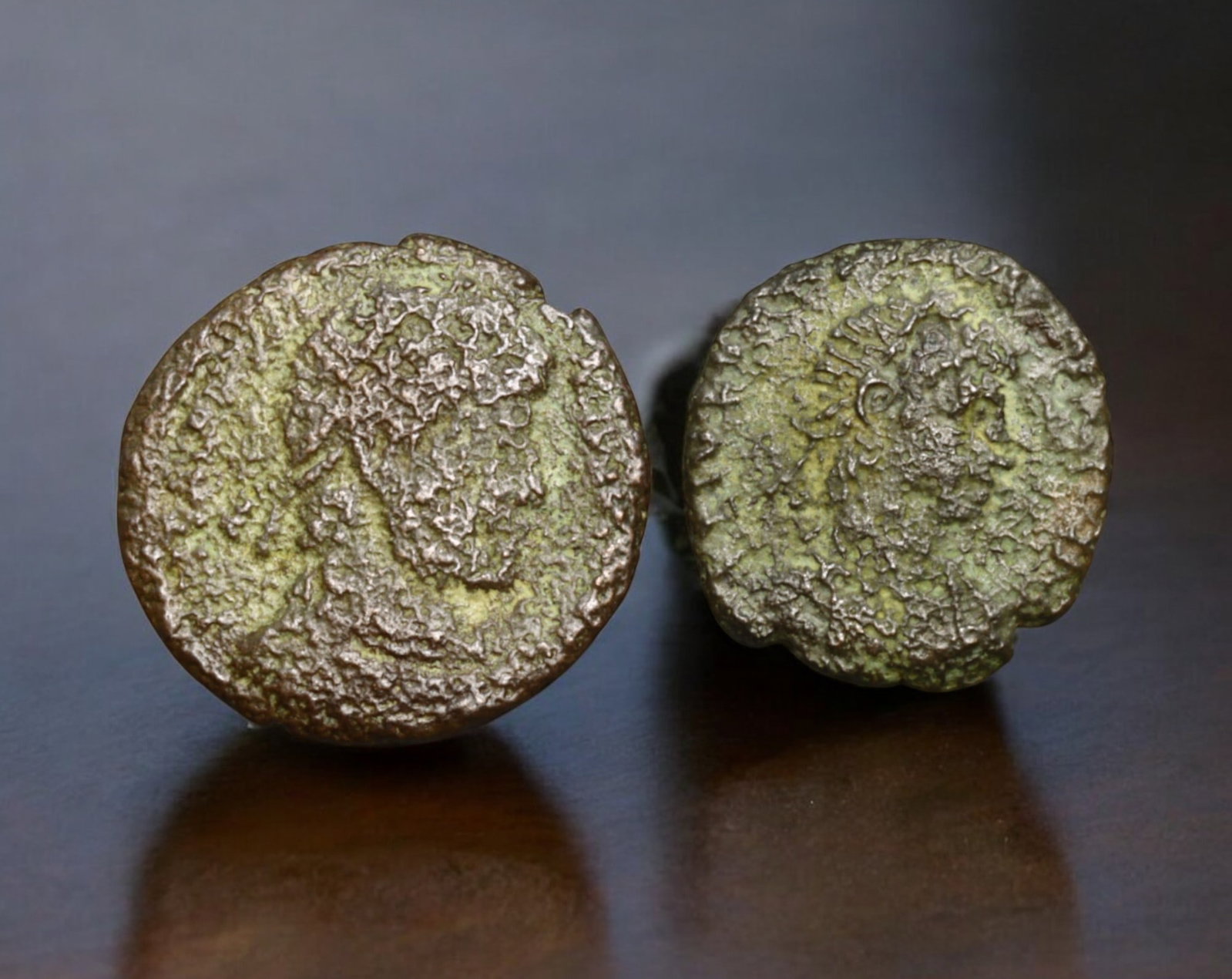 ROMAN EMPIRE: AE Coins - Bronze Issue, 16-18mm, 2.7g, Lot of 2: A lot of bronze coins from the Roman Empire, reflecting the practical monetary fabric of the Imperial economy. These modestly sized bronzes likely span different emperors and issues, underscoring the 