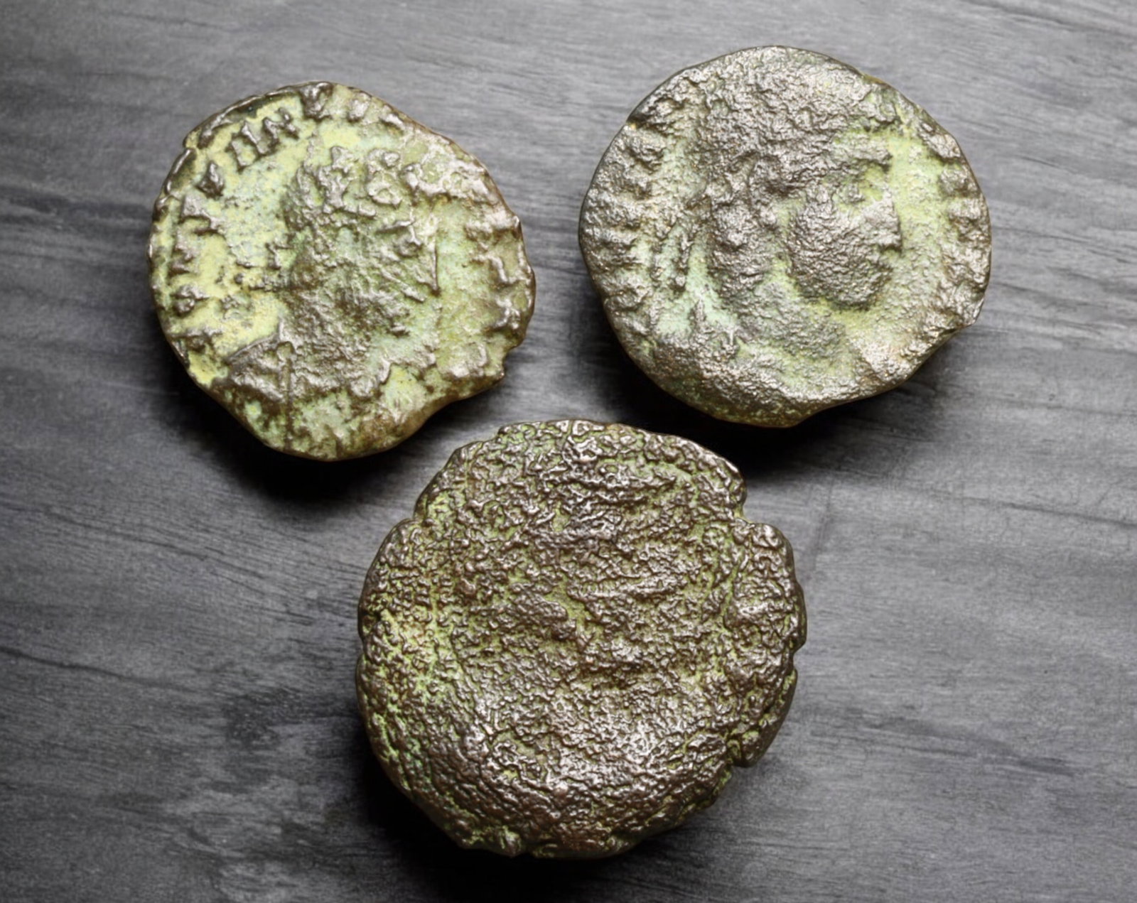 ROMAN EMPIRE: AE Coins - Bronze Issue, 15-18mm, 4.2g, Lot of 3: A lot of bronze coins from the Roman Empire, reflecting the practical monetary fabric of the Imperial economy. These modestly sized bronzes likely span different emperors and issues, underscoring the 