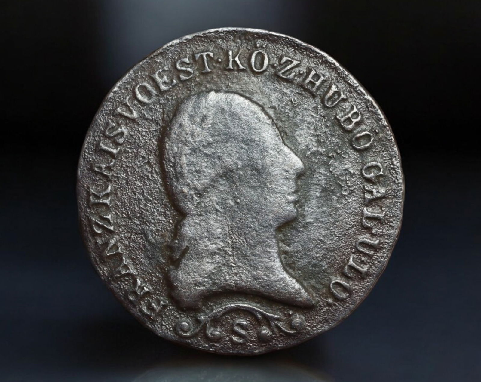 AUSTRIA: Franz I - Copper 1 Kreuzer Coin, 1812 S (Schmollnitz Mint): Struck during the reign of Franz I, this 1812 copper 1 Kreuzer issued at the Schmollnitz Mint (marked "S") features the emperor's laureate bust facing right, surrounded by his full imperial titulature