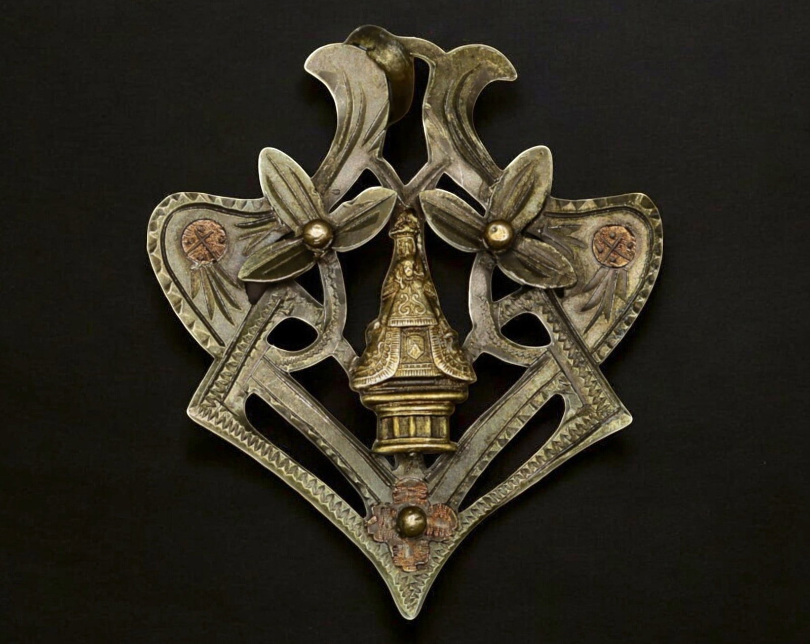 SPAIN: Silver Devotional Pendant - N.S. de la Gleva, 3g, 3.5x3cm: An intricate 3g silver devotional pendant, measuring 3.5x3cm, honoring Nuestra Senora de la Gleva (Our Lady of Gleva), a revered Marian devotion in Catalonia. The central structure, likely representin