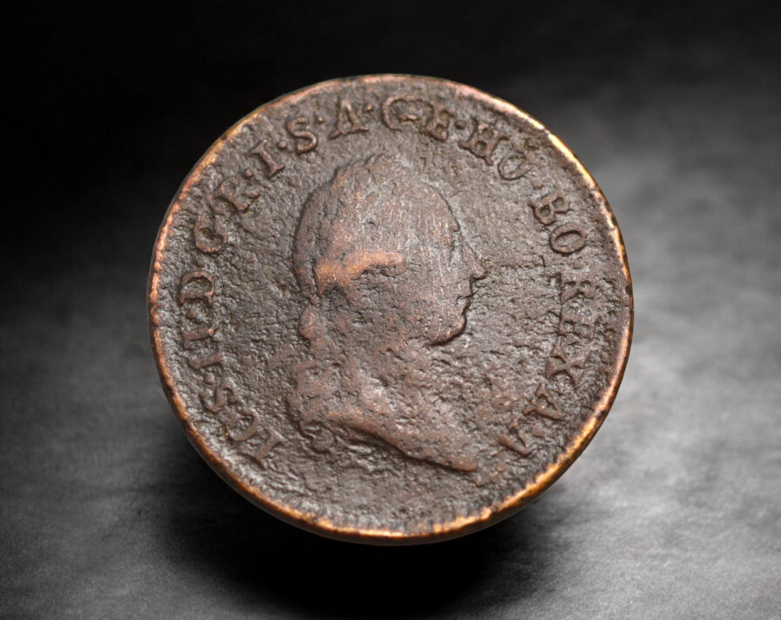 AUSTRIA: Joseph II - Copper 1 Kreuzer, 1781 B, 25mm, 6.9g: Struck during the reign of Enlightenment-era monarch Joseph II, this copper 1 Kreuzer from 1781 (mintmark B for Kremnica) reflects the economic reforms of the Habsburg Empire in the late 18th century.