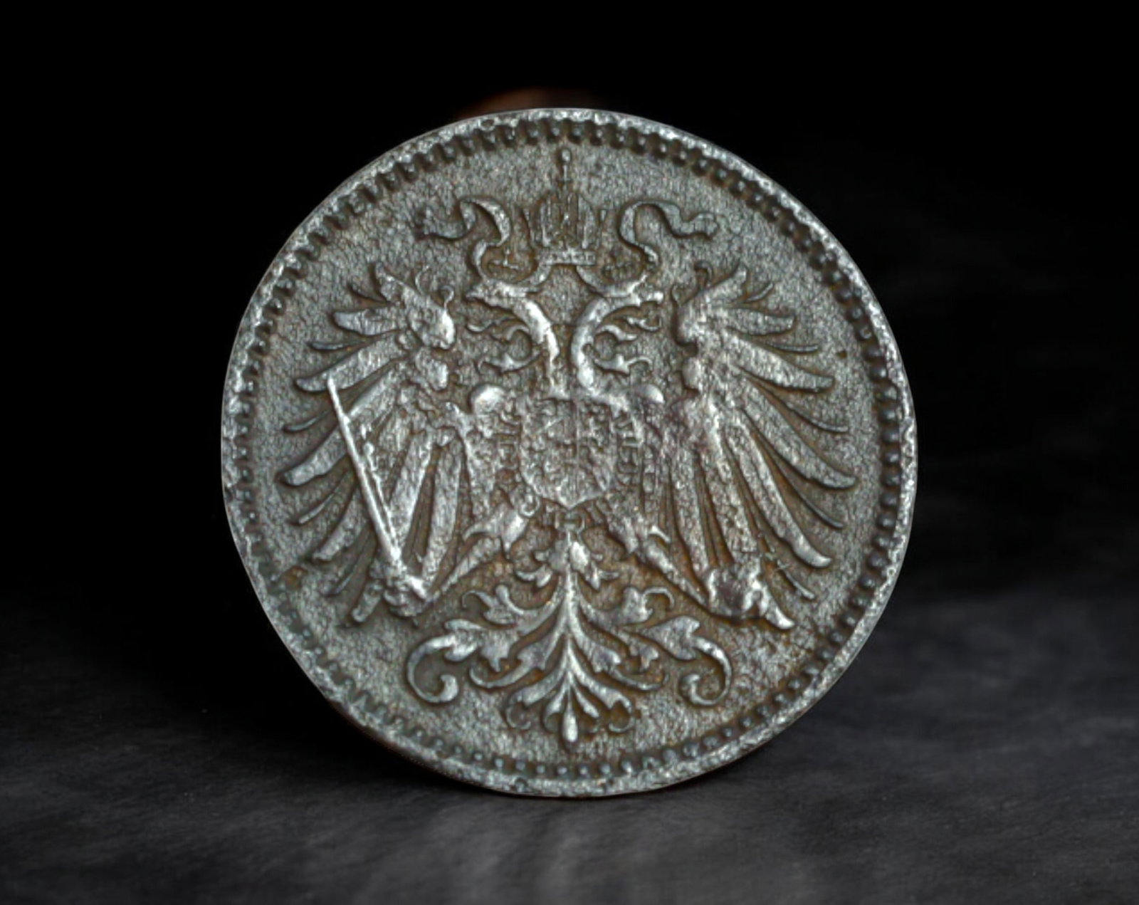 AUSTRIA: Franz Joseph I - Bronze 1 Heller Coin, 1900 Vienna Mint (15mm, 1.5g): Struck in 1900 at the Vienna Mint under Emperor Franz Joseph I, this petite bronze 1 Heller coin reflects the refined artistry of Austro-Hungarian minor coinage at the turn of the 20th century. The ob