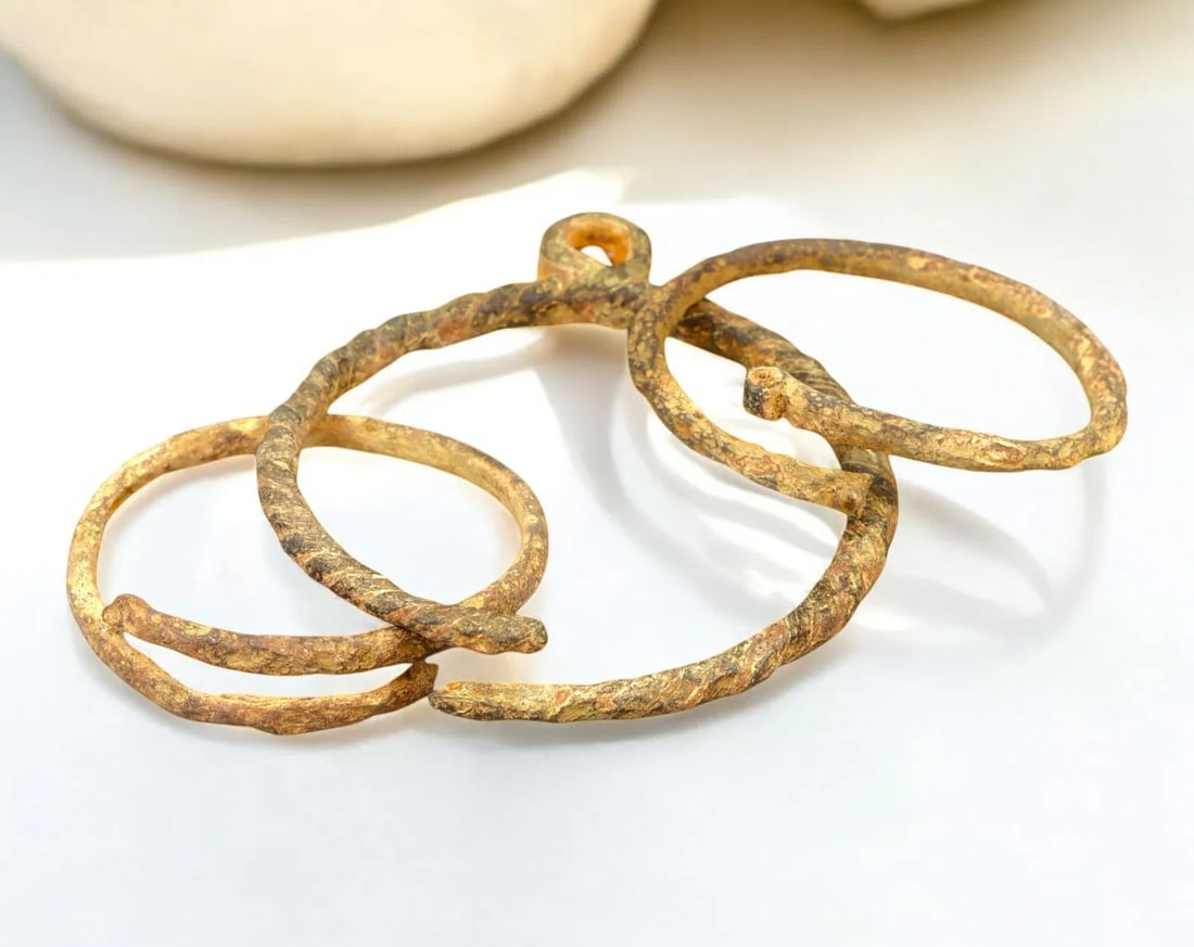 ANCIENT EUROPE: Set of Four Twisted Bronze Rings & Bracelet - Celtic, c. 5th-2nd Century BCE (1 of 2)