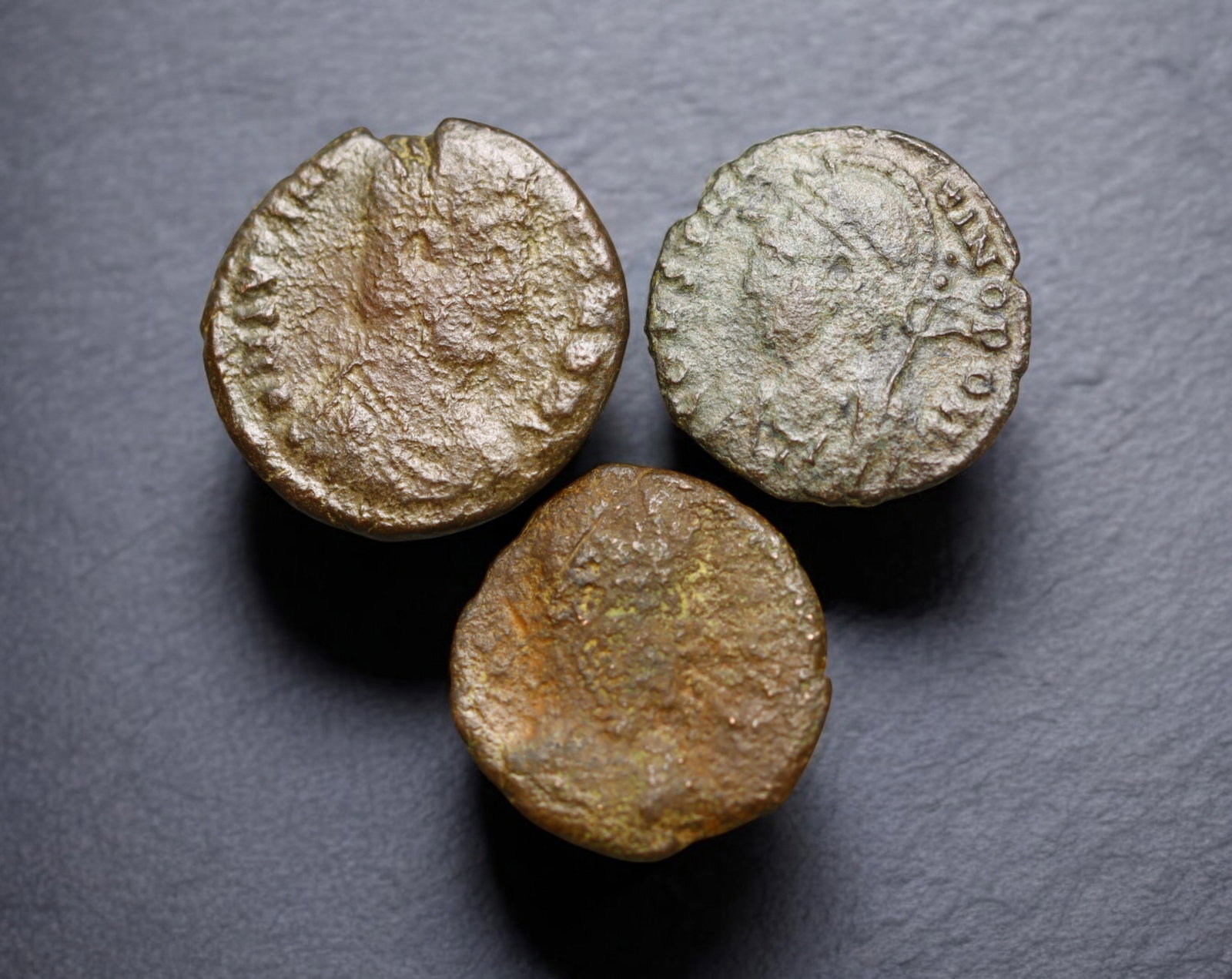 ROMAN EMPIRE: AE Coins - Bronze Issue, 15-17mm, 4.7g, Lot of 3: A lot of bronze coins from the Roman Empire, reflecting the practical monetary fabric of the Imperial economy. These modestly sized bronzes likely span different emperors and issues, underscoring the 
