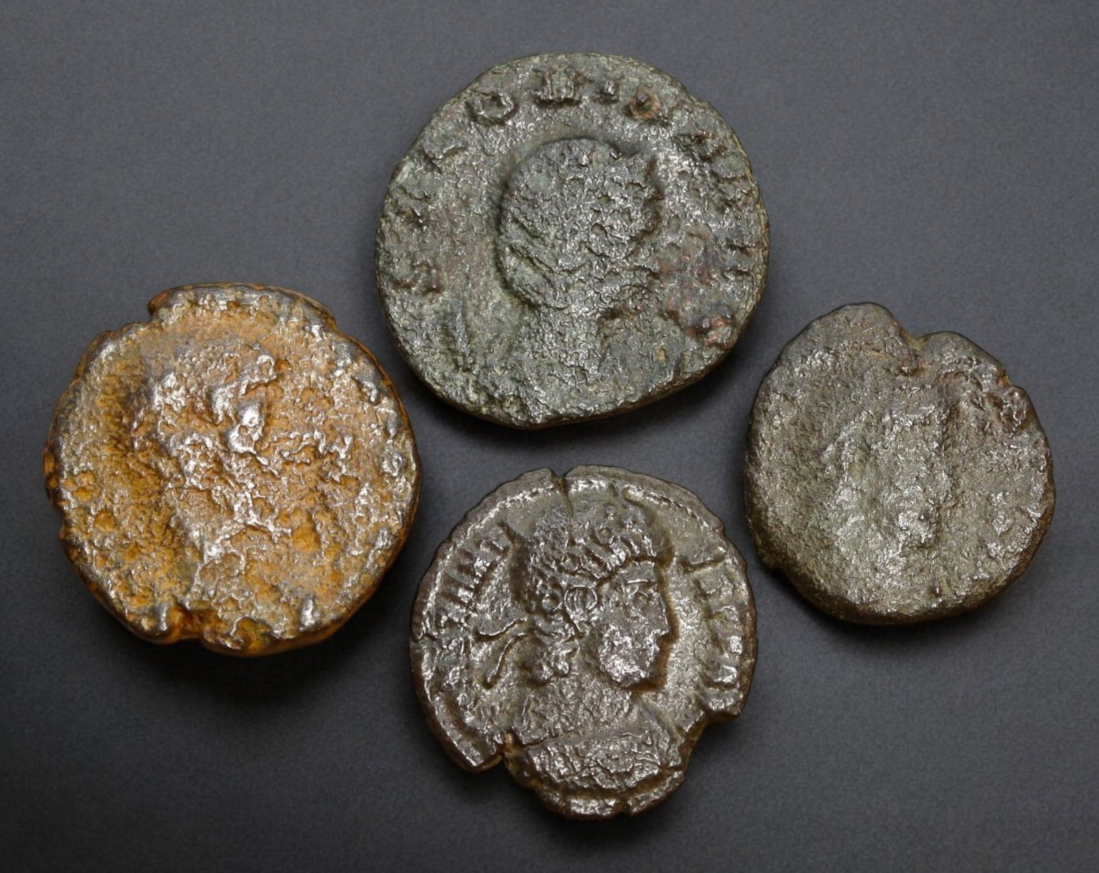 ROMAN EMPIRE: AE Coins - Bronze Issue, 14-18mm, 8.8g, Lot of 4: A lot of bronze coins from the Roman Empire, reflecting the practical monetary fabric of the Imperial economy. These modestly sized bronzes likely span different emperors and issues, underscoring the 