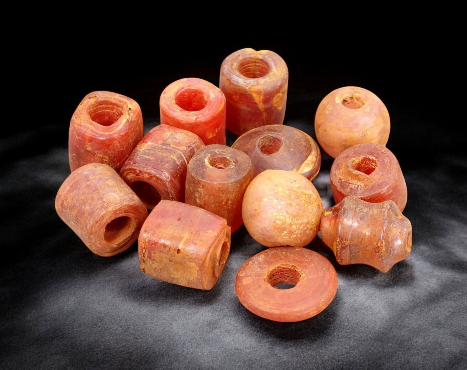 AFRICAN: Antique Carnelian Barrel Beads, (52g, 1-2cm): This vibrant lot features African antique carnelian barrel beads, with a total weight of 52 grams and individual beads ranging from 1 to 2 cm in size. These beads showcase warm reddish-orange hues, ch