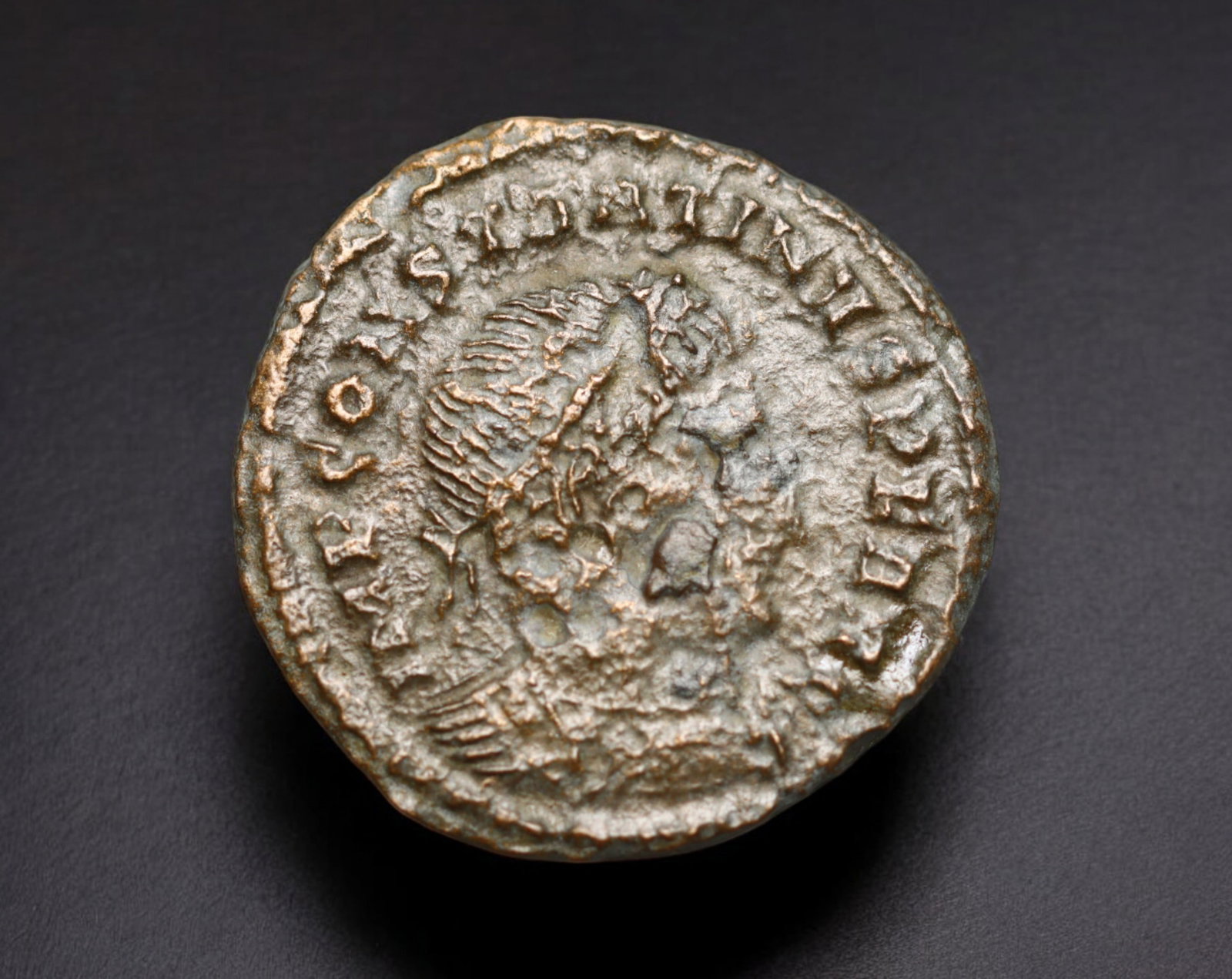 ROMAN EMPIRE: AE Coin - Bronze Issue, 20mm, 3g: A diminutive bronze coin from the Roman Empire, emblematic of the empire's evolving monetary system during times of economic transition. As silver reserves dwindled and inflation surged, bronze coinag