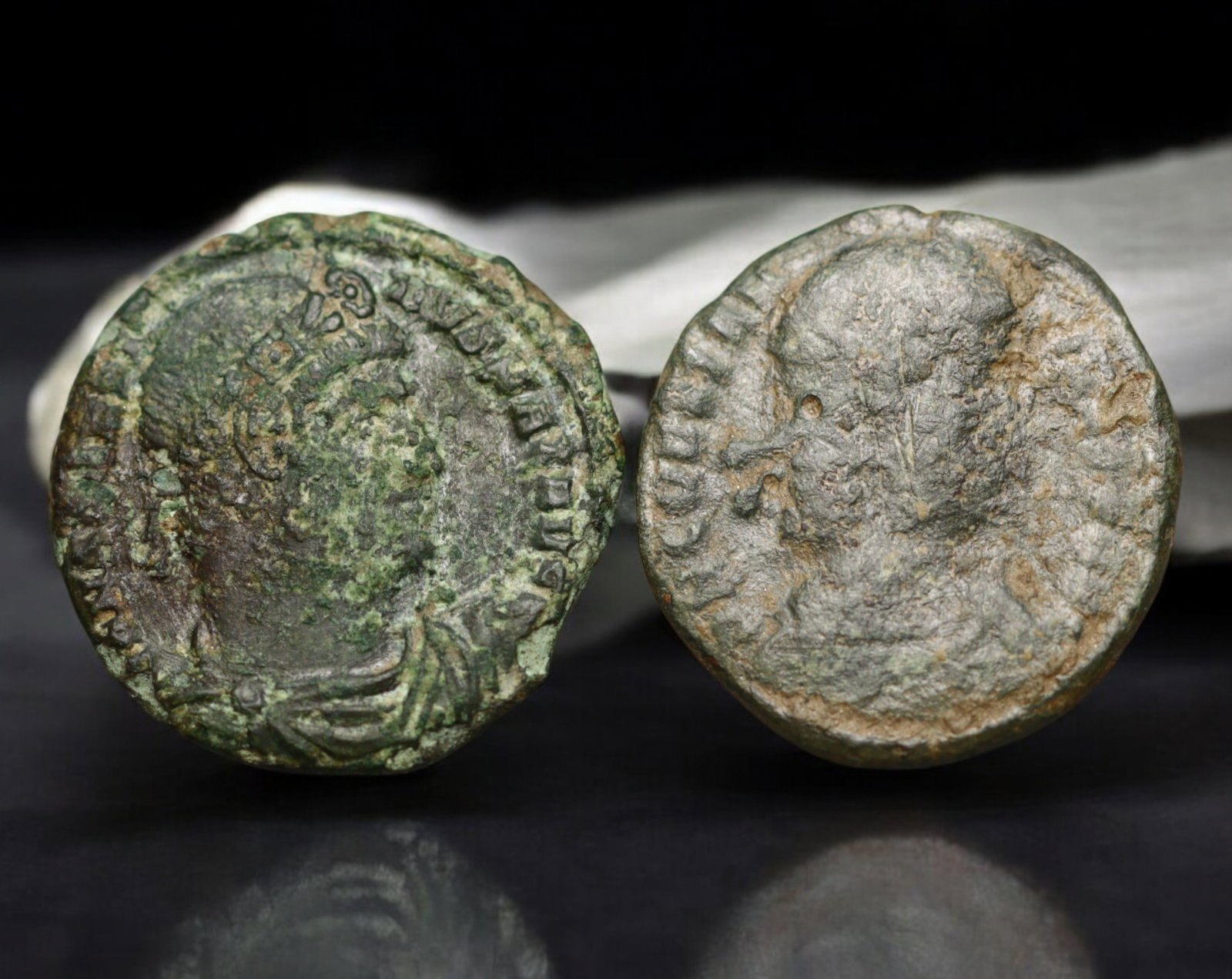 ROMAN EMPIRE: AE Coins - Bronze Issue, 18mm, 5.5g, Lot of 2: A lot of bronze coins from the Roman Empire, reflecting the practical monetary fabric of the Imperial economy. These modestly sized bronzes likely span different emperors and issues, underscoring the 