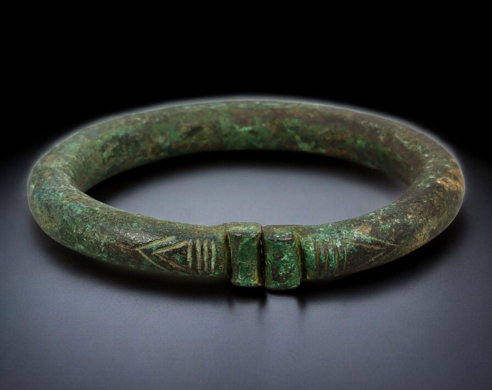 PRE-COLONIAL WEST AFRICA: Currency Bracelet - Cast Bronze, Chevron-Arrow Motif, 9 cm dia. (1 of 3)