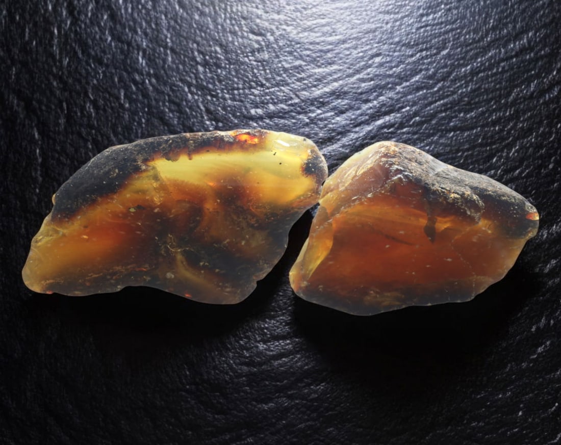 NATURAL: Baltic Amber Specimen Rough - 96g, 6.5-8cm, Fossilized Tree Resin: A stunning set of raw Baltic amber specimens, these unpolished pieces display rich golden hues with deep brown inclusions, characteristic of high-quality fossilized tree resin. The translucency and na