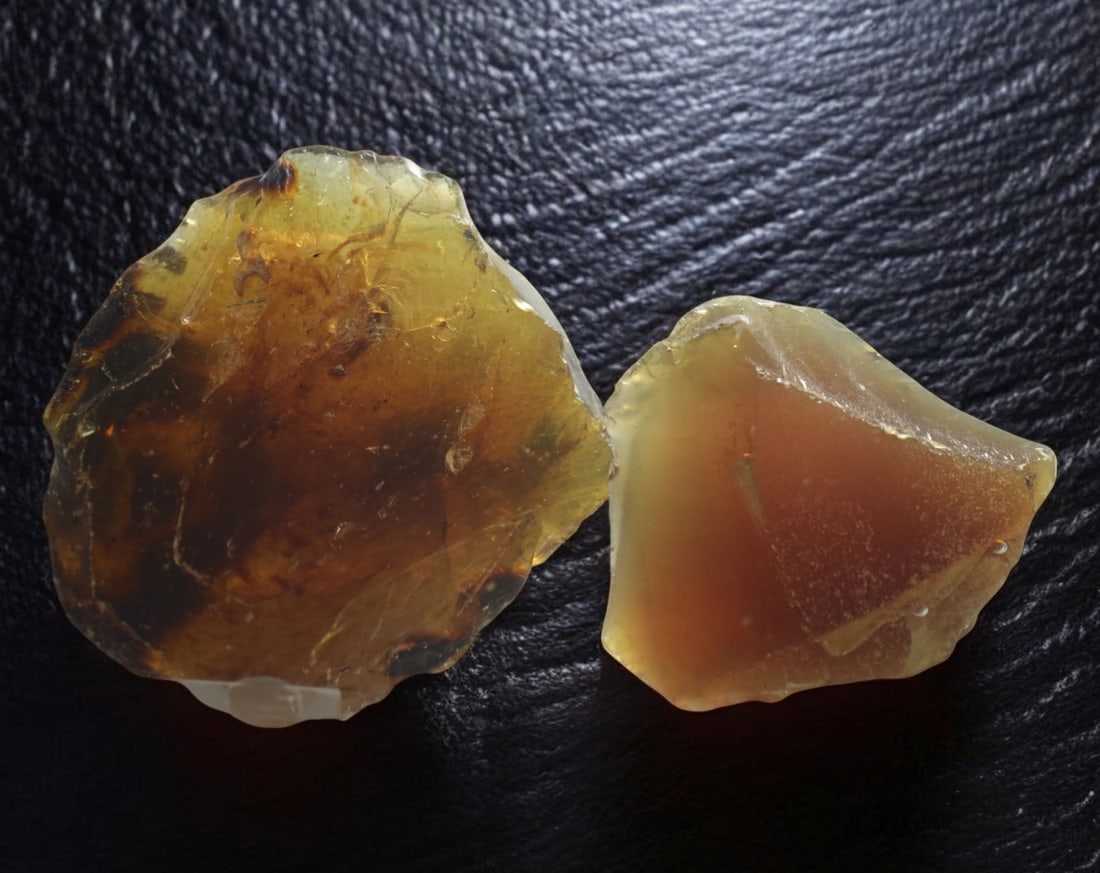 NATURAL: Baltic Amber Specimen Rough - 120g, 6-8cm, Fossilized Tree Resin: A stunning set of raw Baltic amber specimens, these unpolished pieces display rich golden hues with deep brown inclusions, characteristic of high-quality fossilized tree resin. The translucency and na