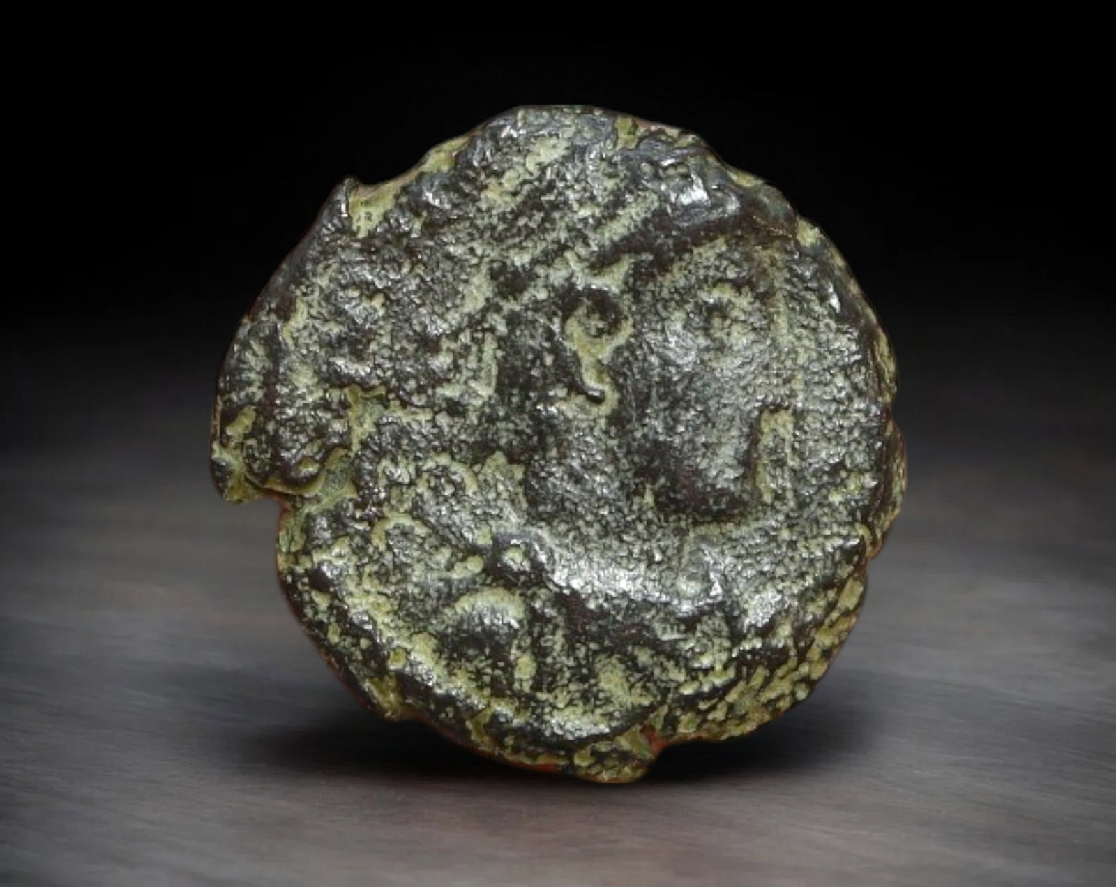 ROMAN EMPIRE: AE Coin - Bronze Issue, 15mm, 2g: A diminutive bronze coin from the Roman Empire, emblematic of the empire's evolving monetary system during times of economic transition. As silver reserves dwindled and inflation surged, bronze coinag