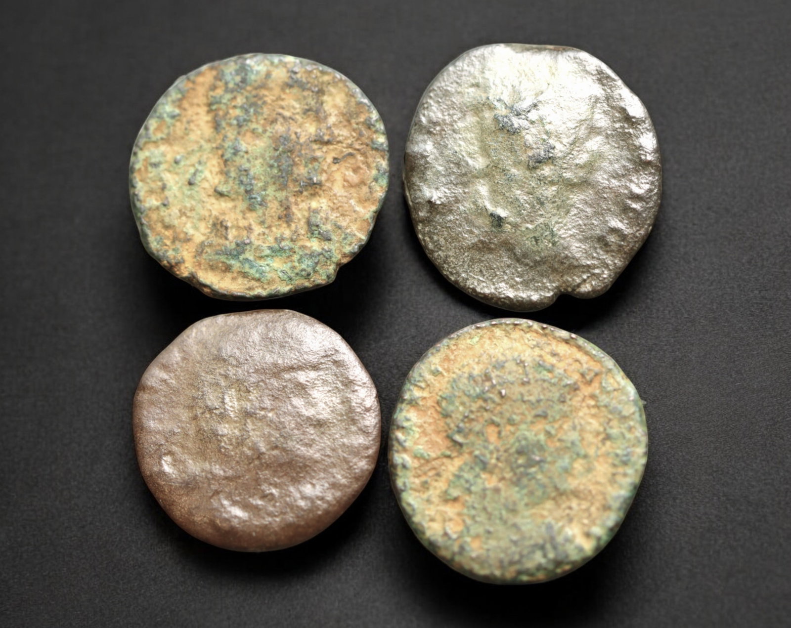 ROMAN EMPIRE: AE Coins - Bronze Issue,16-18mm, 6.3g, Lot of 4: A lot of bronze coins from the Roman Empire, reflecting the practical monetary fabric of the Imperial economy. These modestly sized bronzes likely span different emperors and issues, underscoring the 