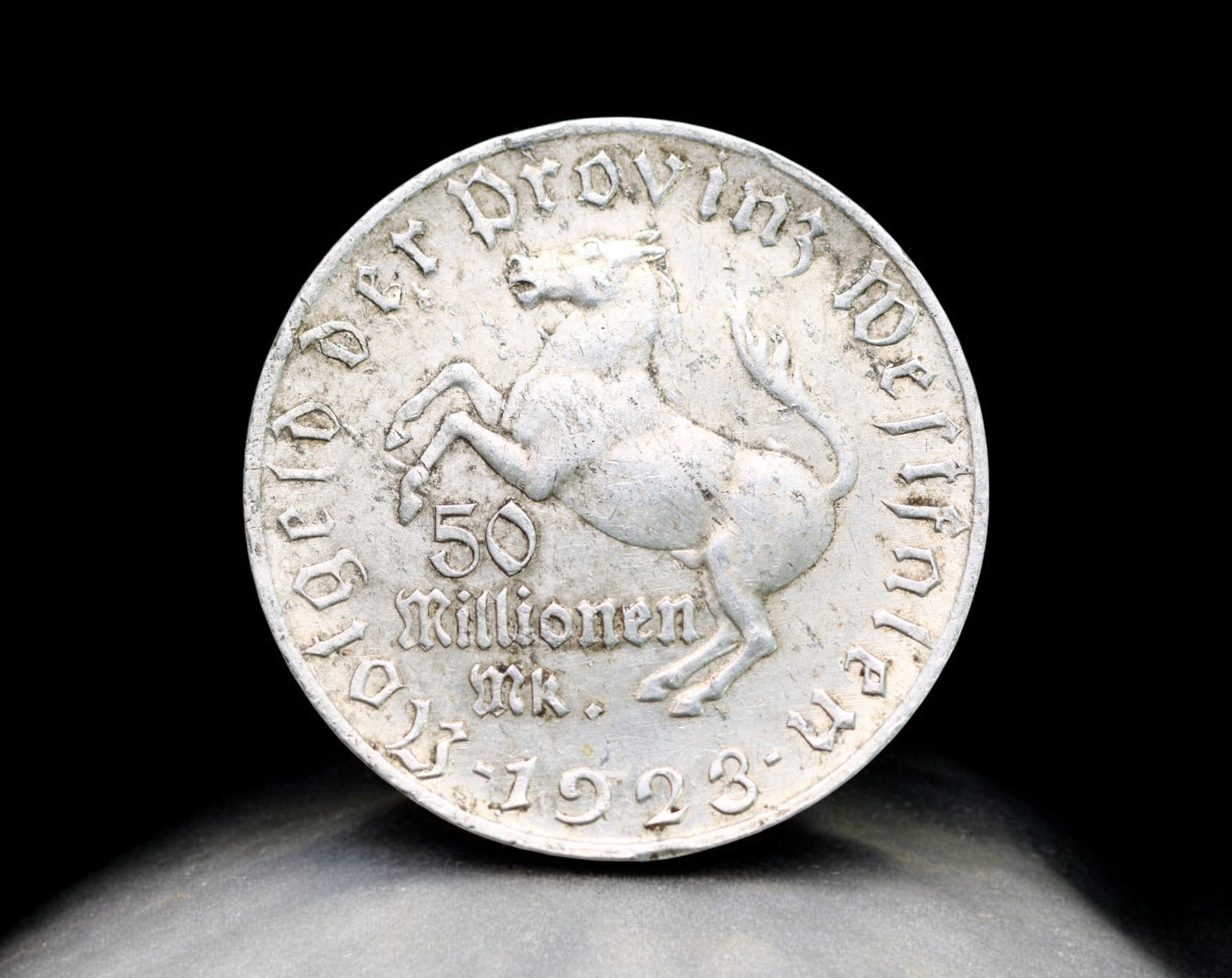 GERMANY: Weimar Republic - Aluminum 50 Millionen Mark Coin, Westphalia 1923 (38mm, 5.5g): Struck amid the catastrophic hyperinflation of 1923, this 50 Millionen Mark coin from the Province of Westphalia embodies one of the most dramatic economic crises in modern history. Cast in lightweigh