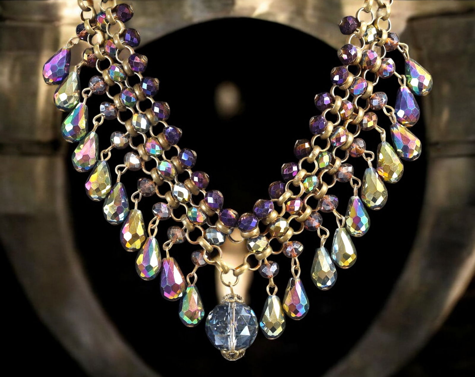 RETRO MODERN: Bib Necklace - Brass Chain with Aurora Borealis Glass Drops, 46cm (109g): zzling example of Retro Modern drama, this 46 cm bib necklace features cascading rows of faceted aurora borealis glass drops suspended from double strands of antiqued brass chain. Weighing 109g, the p