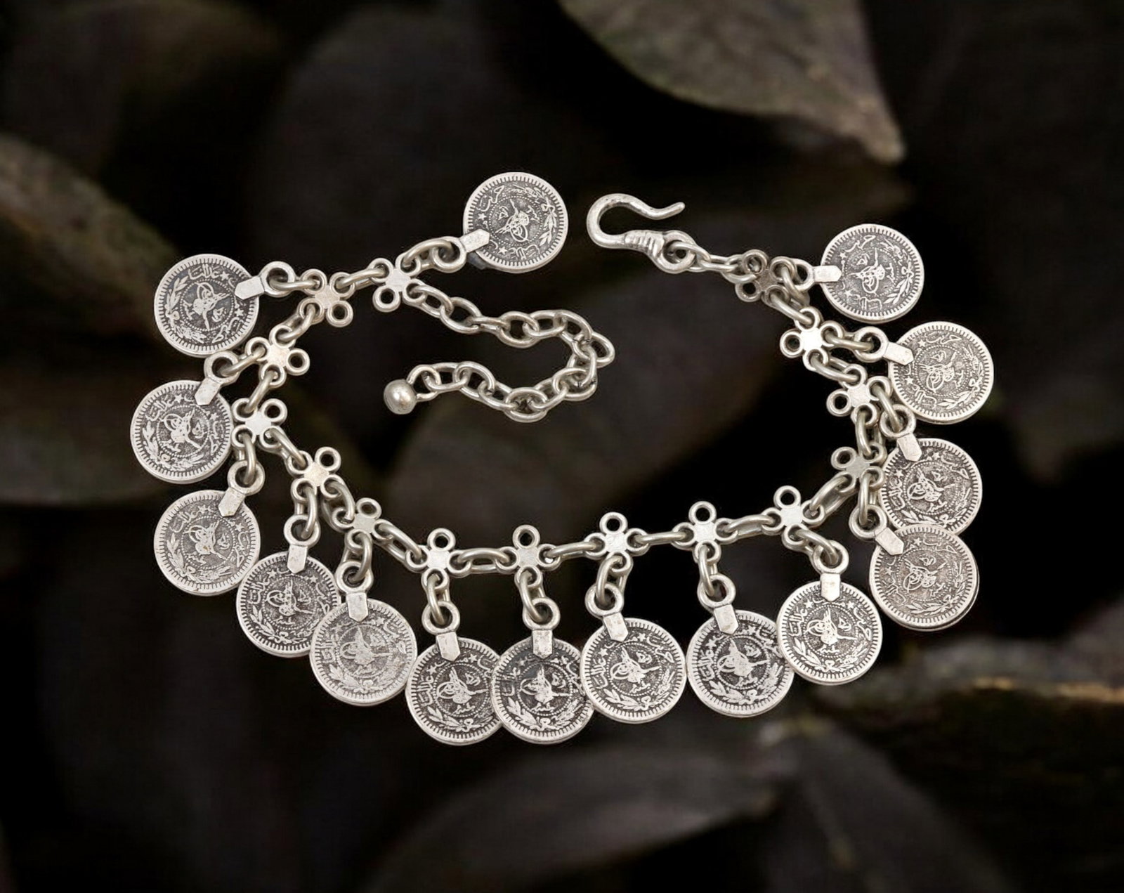 OTTOMAN REVIVAL: Bracelet - White Metal with Tughra Coin Charms, 28.5cm (33g): This Ottoman Revival bracelet is composed of a rhythmic series of linked white metal medallions, each suspended from a trefoil-style chain and engraved with the tughra-an imperial calligraphic cipher 