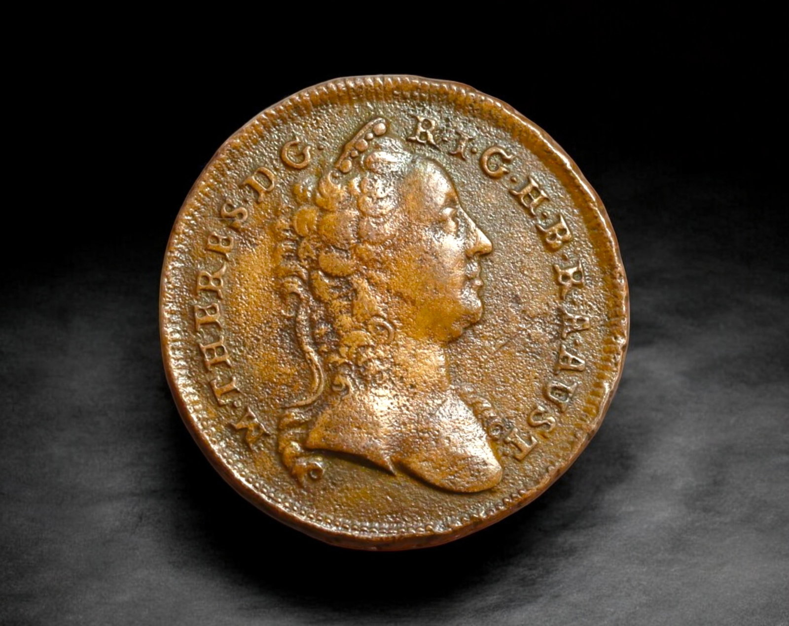 AUSTRIA: Maria Theresia - Copper 1 Kreuzer Coin, 1763 W Vienna Mint (25mm, 11g): Struck at the Vienna Mint in 1763 under Empress Maria Theresia, this copper 1 Kreuzer Coin coin weighs 11g and measures 25mm in diameter. The obverse bears a finely detailed right-facing bust of Maria