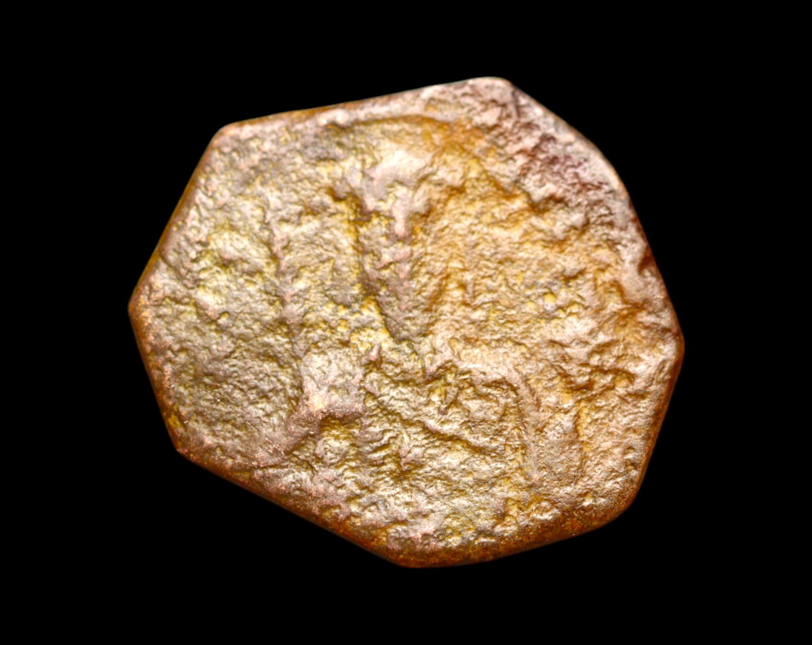 BYZANTINE EMPIRE: AE Tetarteron - Cross and Monogram, 18x16mm, 1.2g: Petite yet symbolically rich, this bronze tetarteron from the Byzantine Empire measures 18x16mm and weighs 1.2g. Its compact form is characteristic of late-period bronze issues, with prominent cross m