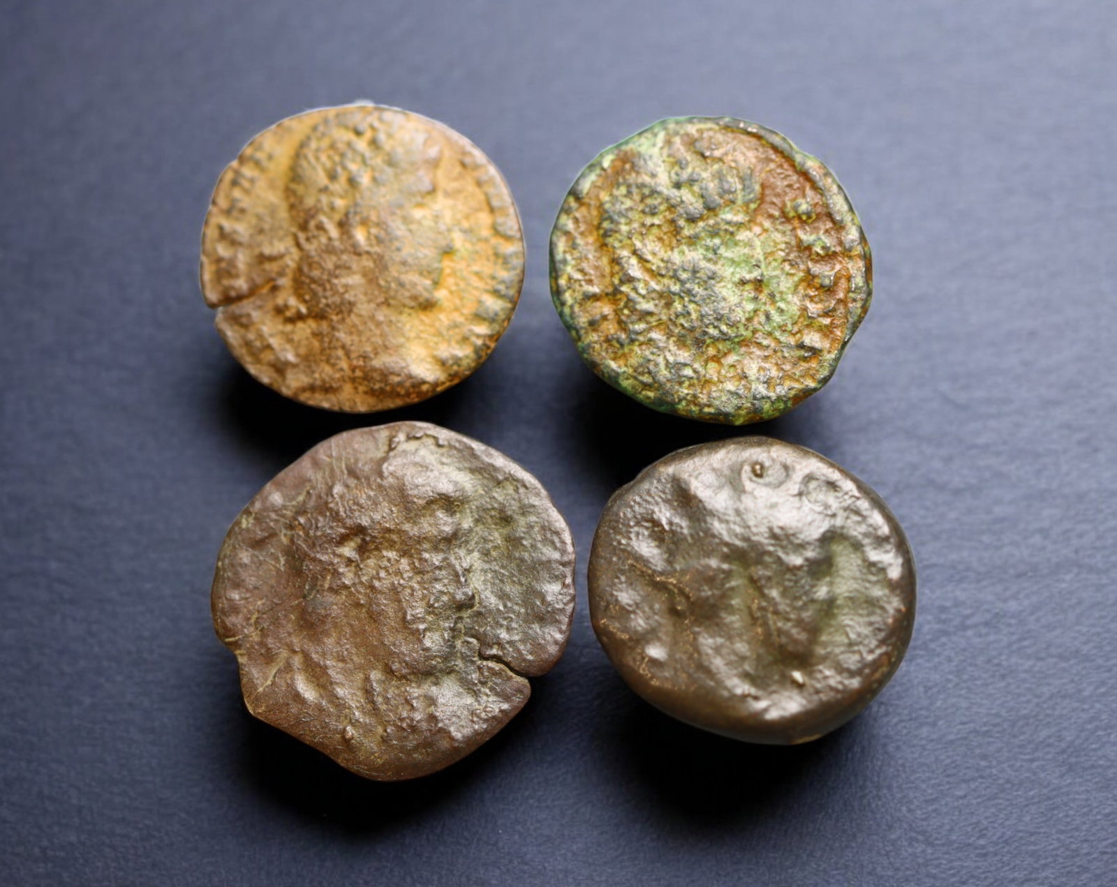 ROMAN EMPIRE: AE Coins - Bronze Issue, 14-16mm, 4.7g, Lot of 4: A lot of bronze coins from the Roman Empire, reflecting the practical monetary fabric of the Imperial economy. These modestly sized bronzes likely span different emperors and issues, underscoring the 
