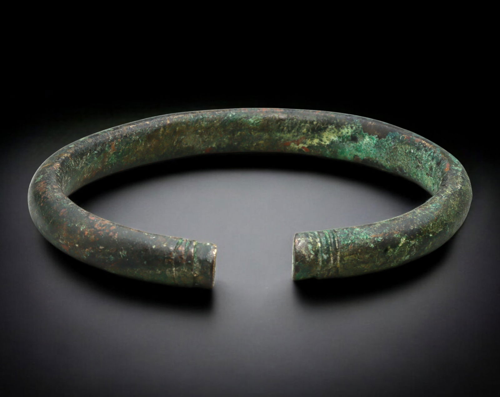 WEST AFRICA: Bronze Currency Bracelet - Rounded Form with Banded Terminals, 19th Century or Earlier (1 of 3)