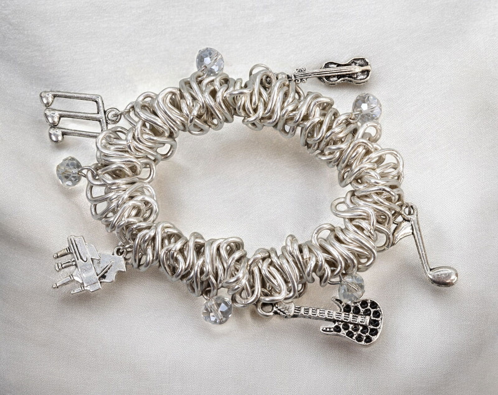 RETRO MODERN: Bracelet - Silver-Tone Coil with Musical Charms & Crystal Accents, 14cm (67g) (1 of 2)