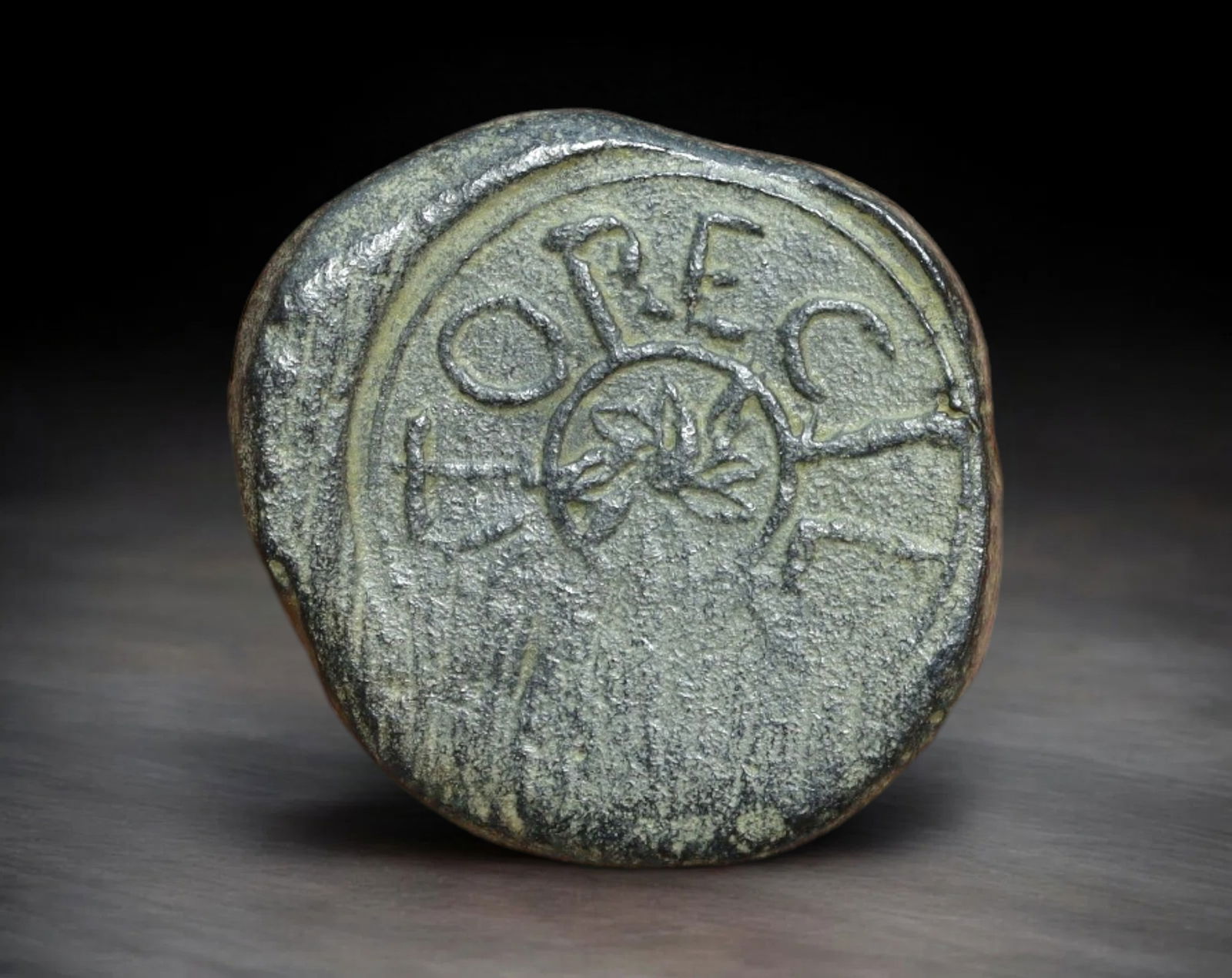UNKNOWN ORIGIN: Bronze Coin - Radiating Lines & "OREC" Inscription, undated (25mm, 9.1g) (1 of 2)