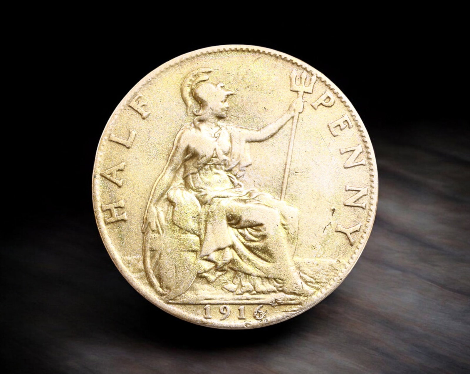 UNITED KINGDOM: George V - Bronze 1/2 Penny Coin, 1919 (25mm, 5.7g): Issued under King George V in 1919, this bronze 1/2 Penny coin displays the left-facing bust of the monarch crowned with the legend "GEORGIVS V DEI GRA: BRITT: OMN: REX FID: DEF: IND: IMP:". The rever