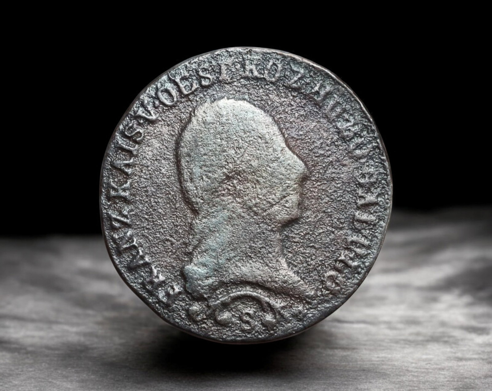 AUSTRIA: Franz I - Copper 1 Kreuzer Coin Coin, 1812 S (Schmollnitz Mint): Struck during the reign of Franz I, this 1812 copper 1 Kreuzer Coin issued at the Schmollnitz Mint (marked "S") features the emperor's laureate bust facing right, surrounded by his full imperial titul