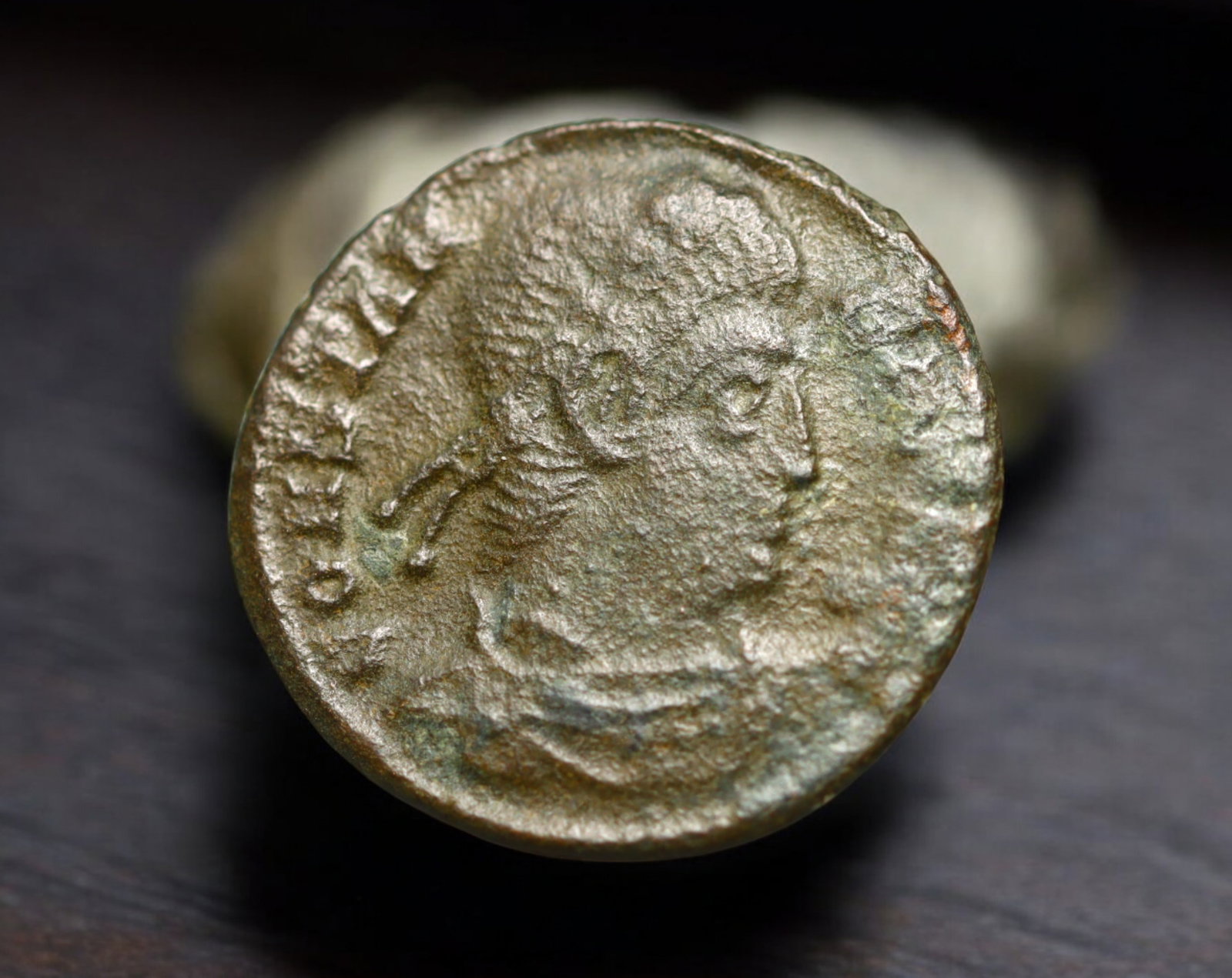 ROMAN EMPIRE: AE Coin - Bronze Issue, 16mm, 1.1g: A diminutive bronze coin from the Roman Empire, emblematic of the empire's evolving monetary system during times of economic transition. As silver reserves dwindled and inflation surged, bronze coinag
