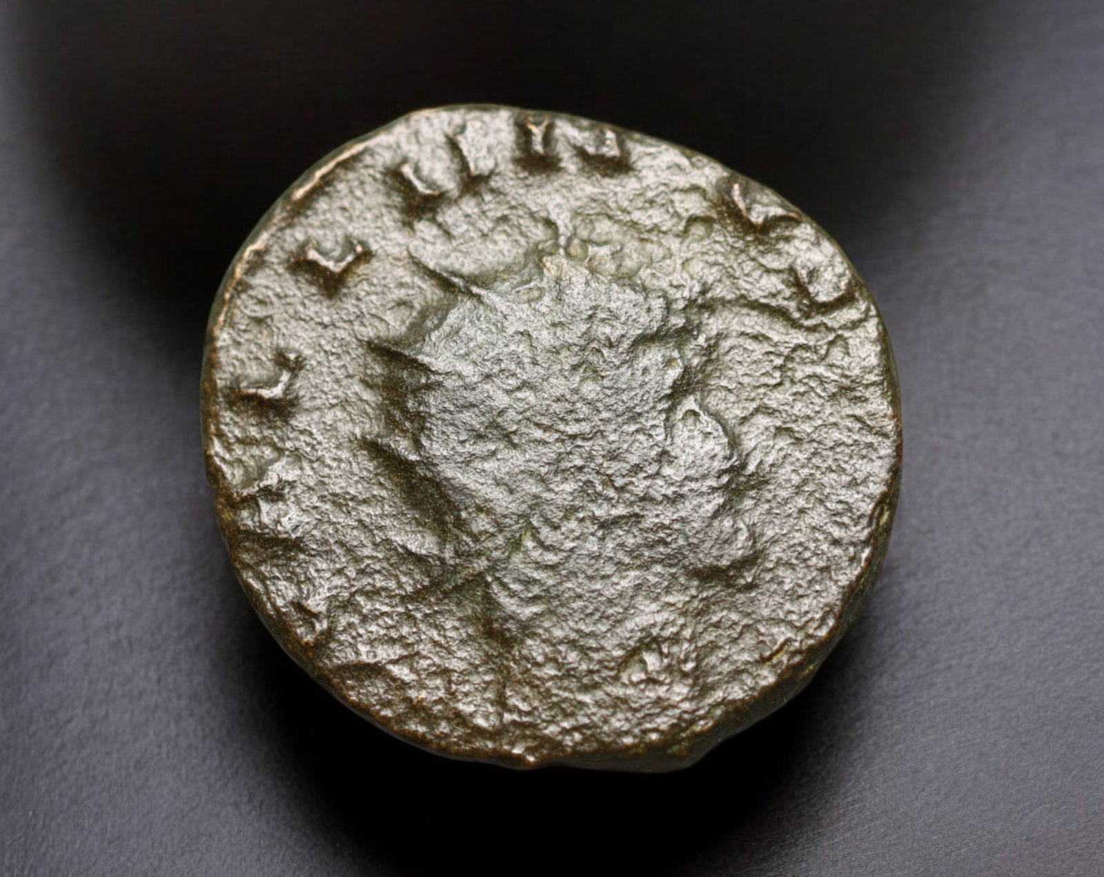 ROMAN EMPIRE: AE Coin - Bronze Issue, 18mm, 2.1g: A diminutive bronze coin from the Roman Empire, emblematic of the empire's evolving monetary system during times of economic transition. As silver reserves dwindled and inflation surged, bronze coinag