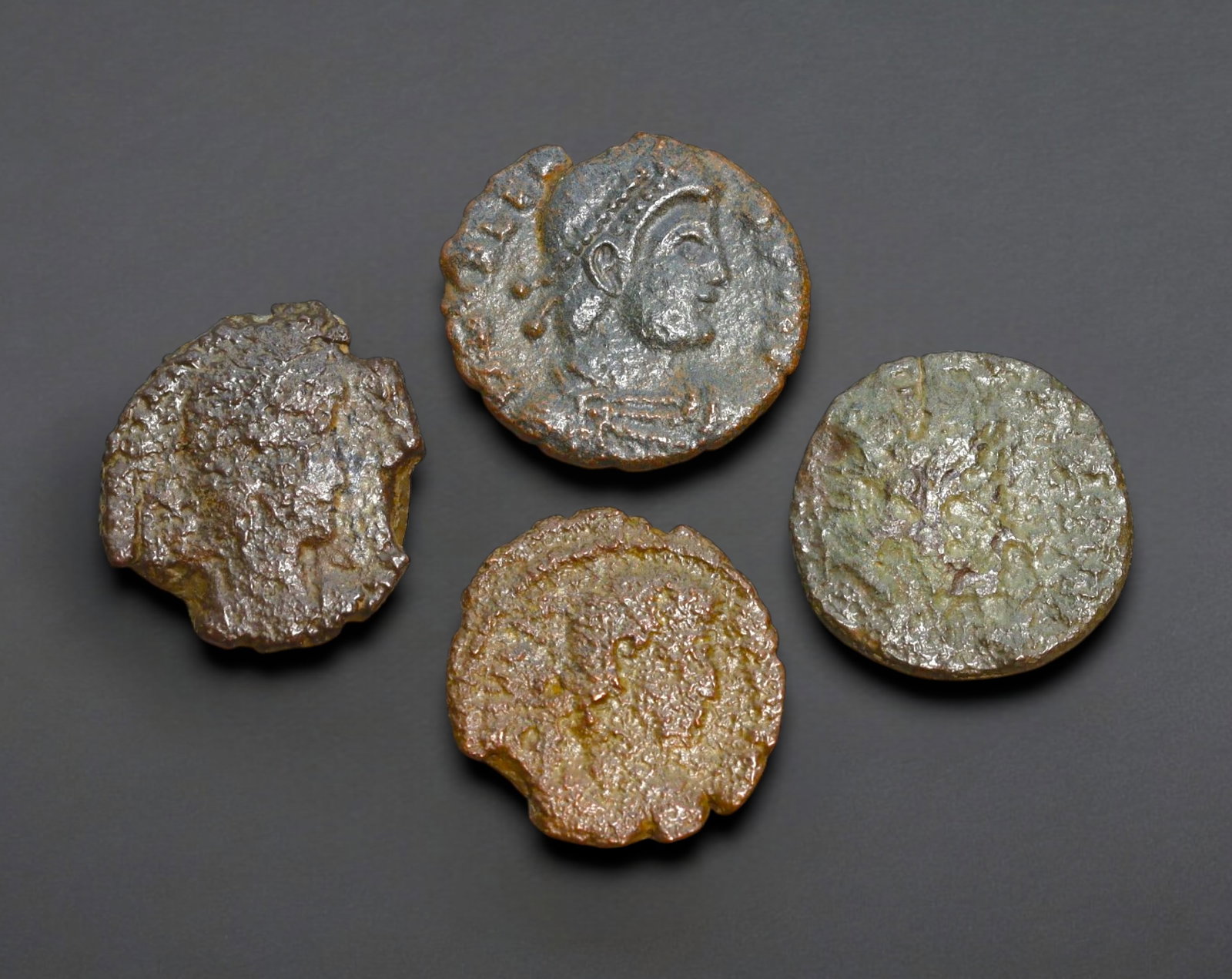 ROMAN EMPIRE: AE Coins - Bronze Issue, 15-17mm, 7.8g, Lot of 4: A lot of bronze coins from the Roman Empire, reflecting the practical monetary fabric of the Imperial economy. These modestly sized bronzes likely span different emperors and issues, underscoring the 