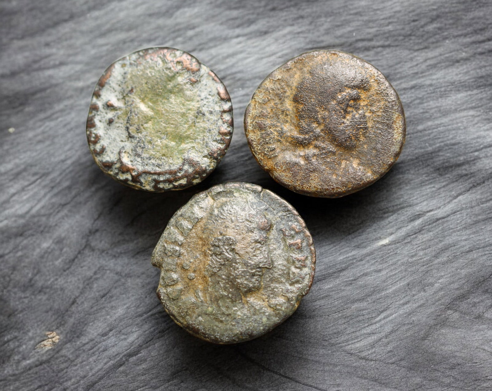 ROMAN EMPIRE: AE Coins - Bronze Issue, 14-16mm, 3.8g, Lot of 3: A lot of bronze coins from the Roman Empire, reflecting the practical monetary fabric of the Imperial economy. These modestly sized bronzes likely span different emperors and issues, underscoring the 