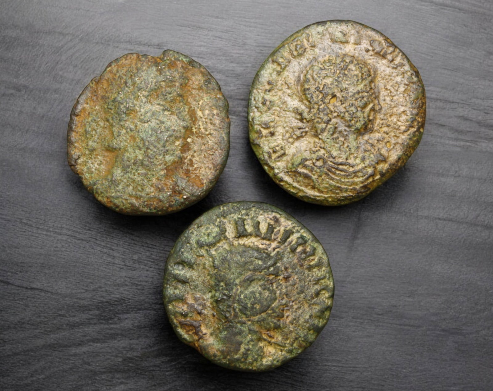 ROMAN EMPIRE: AE Coins - Bronze Issue, 16-18mm, 4.4g, Lot of 3: A lot of bronze coins from the Roman Empire, reflecting the practical monetary fabric of the Imperial economy. These modestly sized bronzes likely span different emperors and issues, underscoring the 
