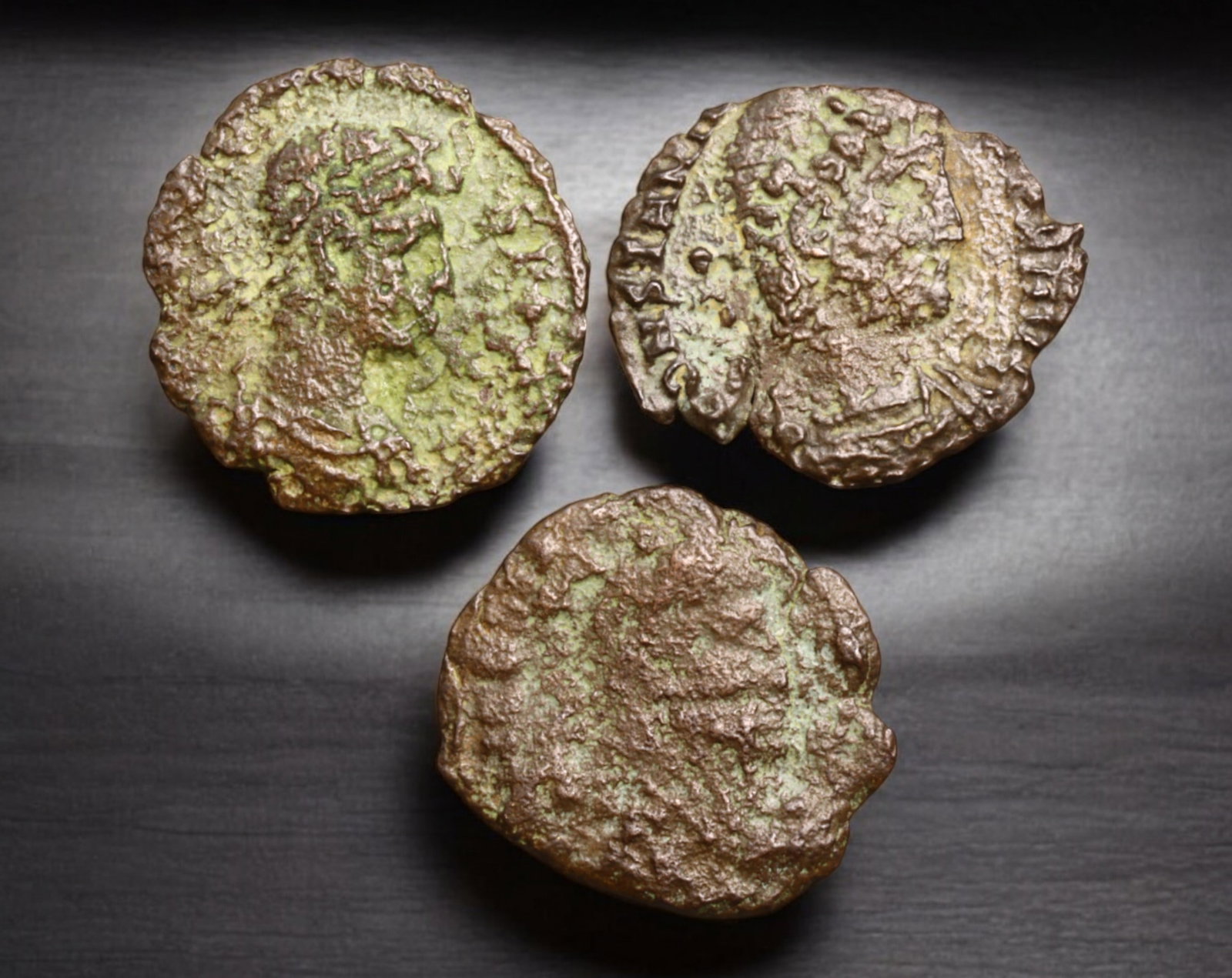 ROMAN EMPIRE: AE Coins - Bronze Issue, 15-16mm, 2.9g, Lot of 3: A lot of bronze coins from the Roman Empire, reflecting the practical monetary fabric of the Imperial economy. These modestly sized bronzes likely span different emperors and issues, underscoring the 