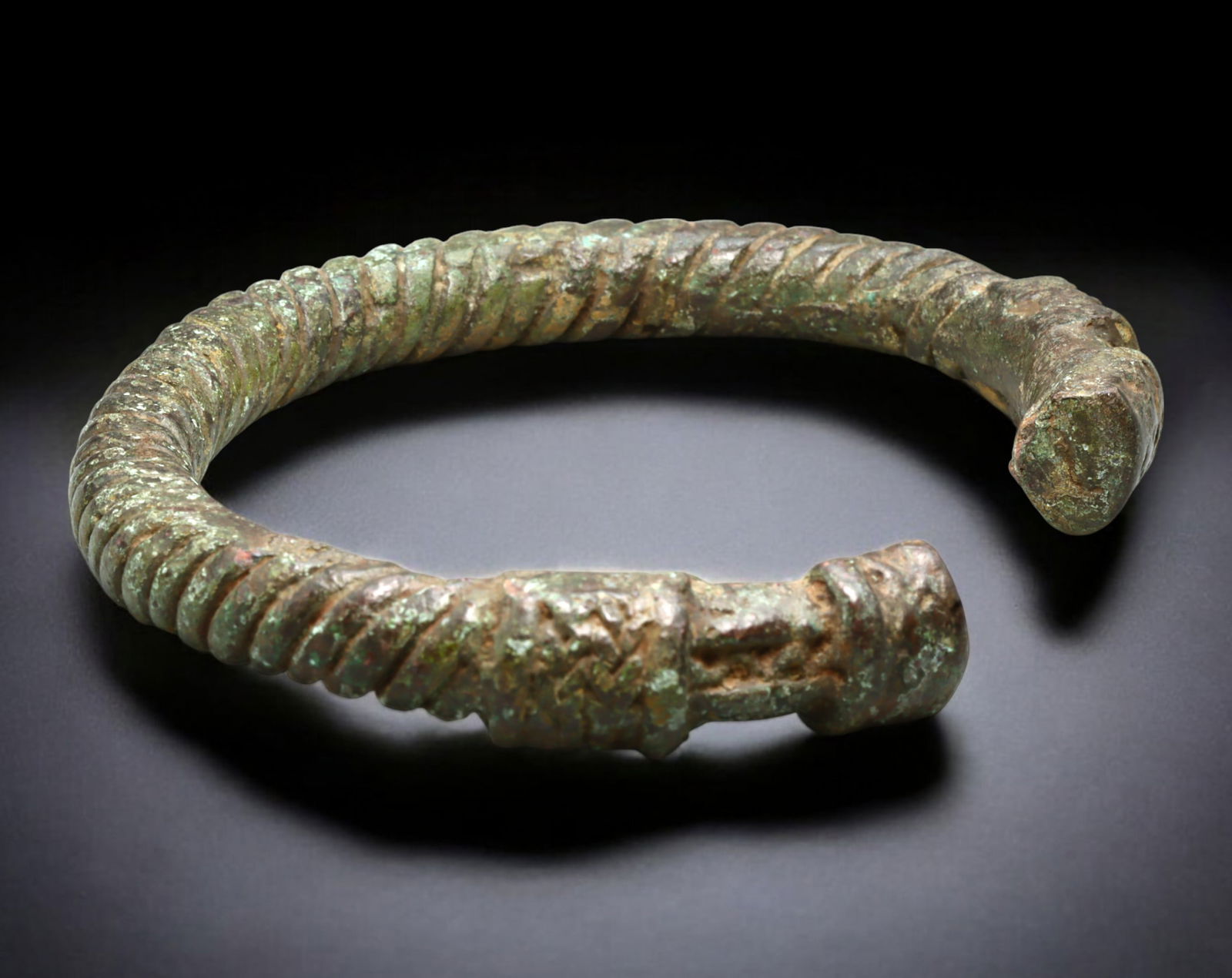 WEST AFRICA: Bronze Currency Bracelet - Ribbed Spiral Torque with Flared Terminals, 9.5 cm dia. (1 of 3)