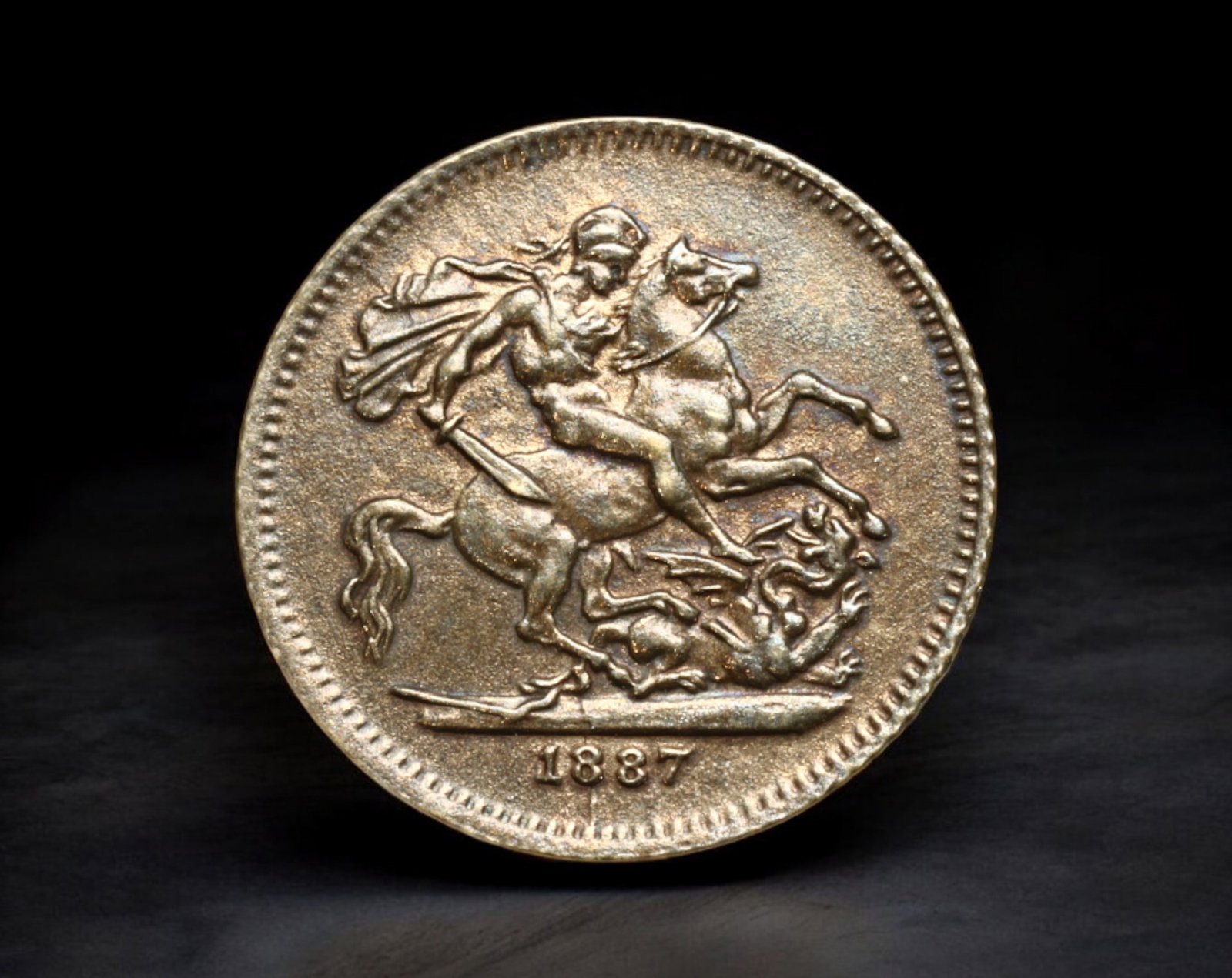 UNITED KINGDOM Germany:Queen Victoria -Tin Imitation 2 Sovereign Coin,1887 Jubilee,Nurnberg13mm,0.5g: Struck in Nurnberg, Germany, this miniature tin token mimics the British 2 Sovereign gold coin issued for Queen Victoria's Golden Jubilee in 1887. The obverse presents a crowned bust of the Queen drap